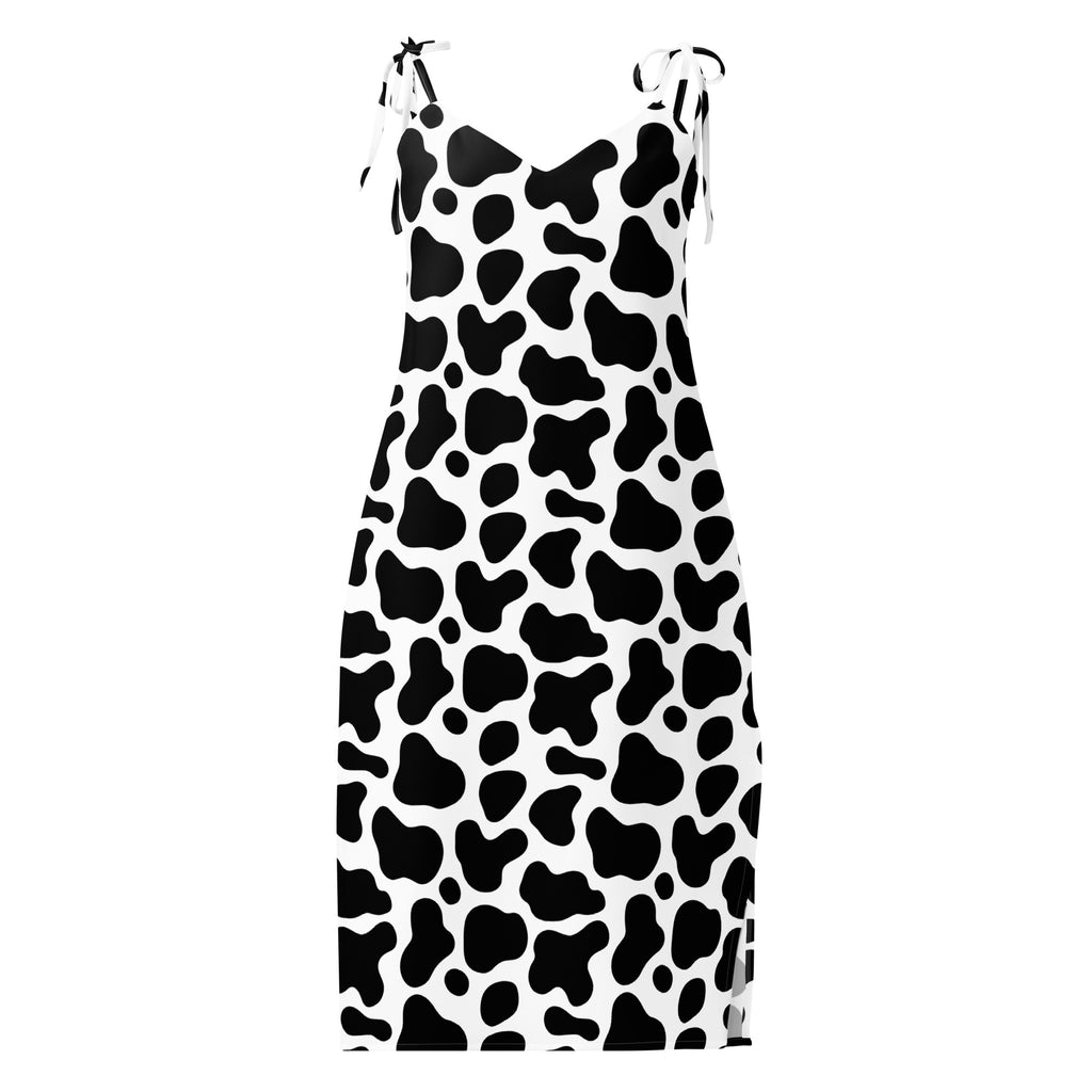 Dress with black and white cow pattern on a white background