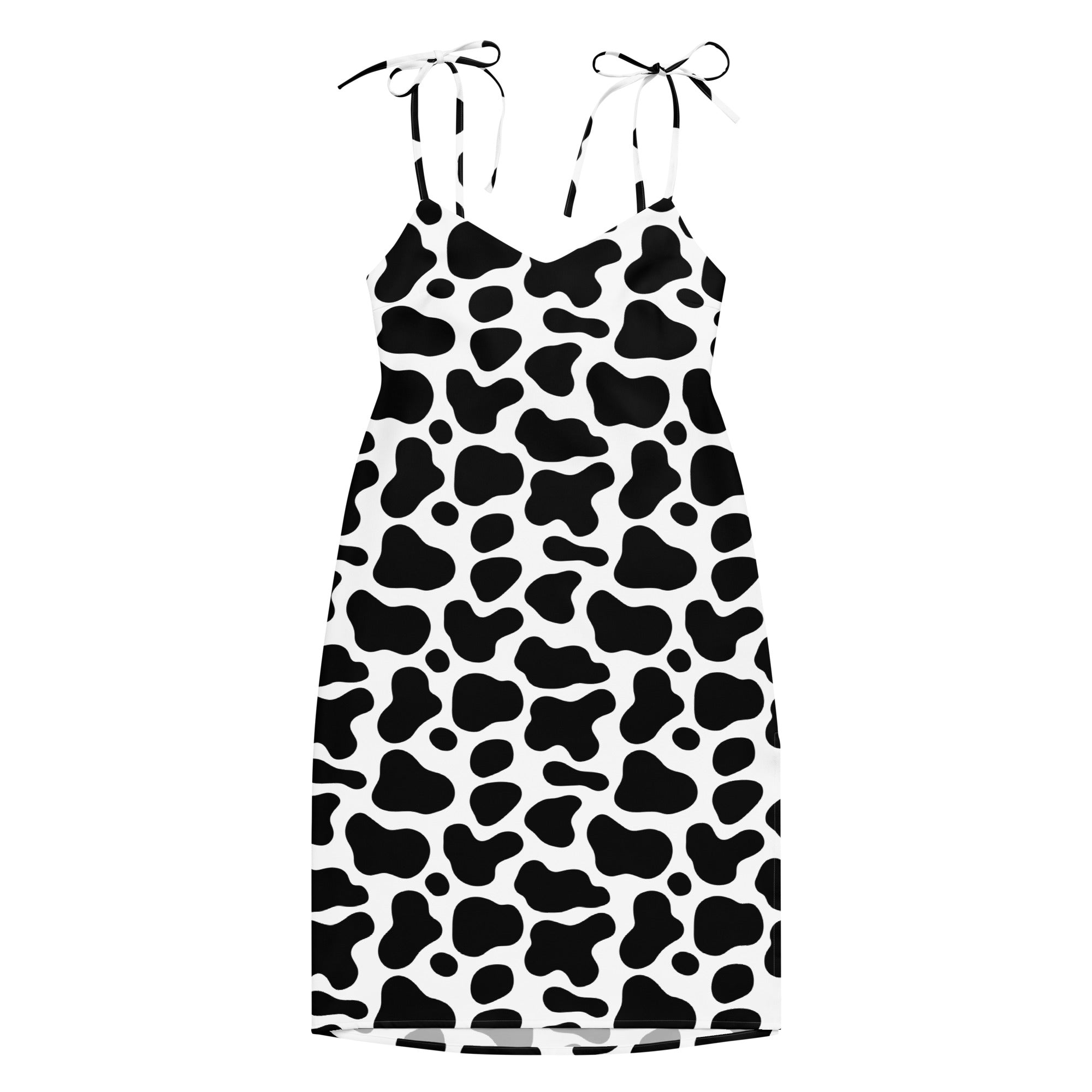 Dress with black and white cow print pattern on a white background