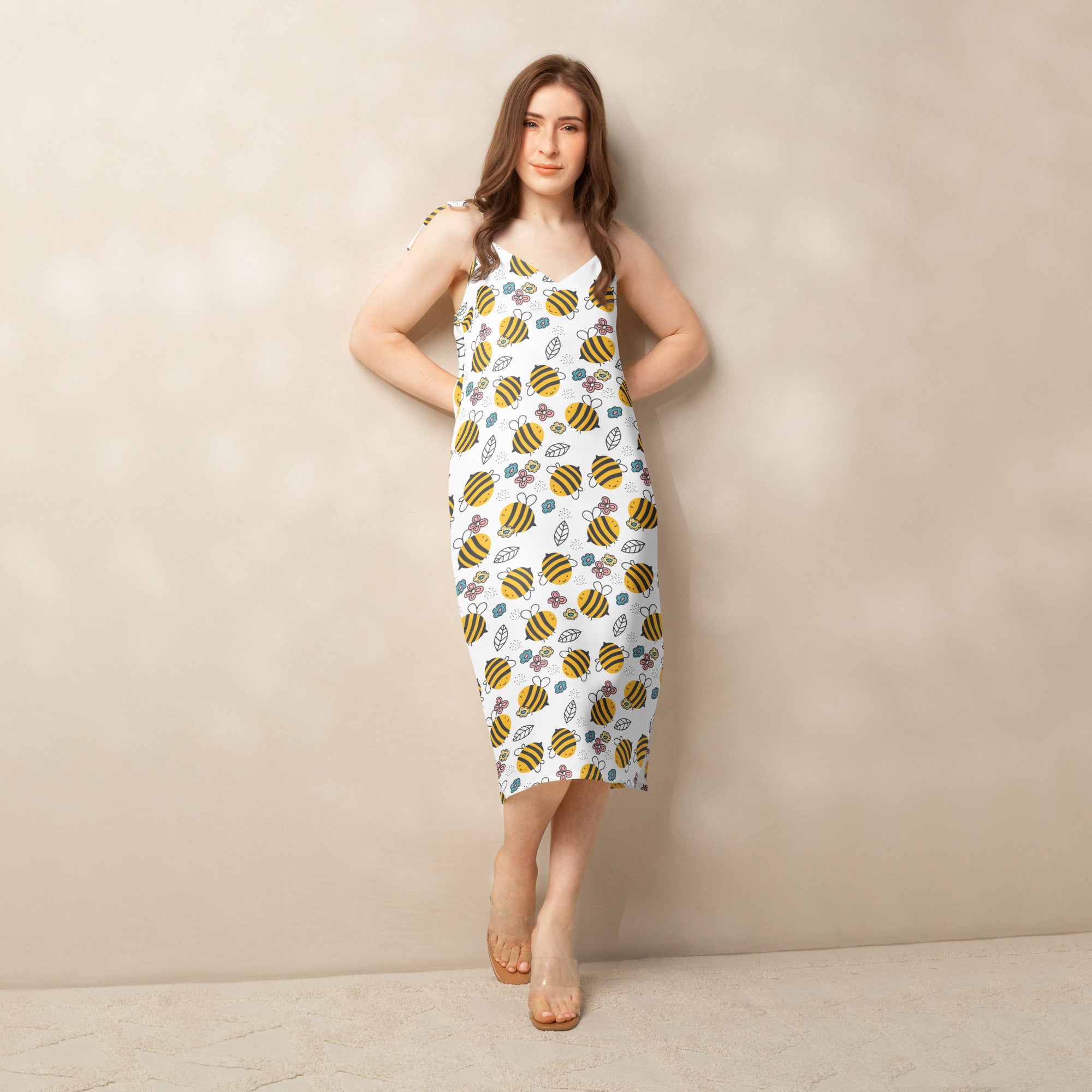 Women’s floral yellow bumblebee white sleeveless midi dress with adjustable tie straps and built-in bra featuring bee and flower print