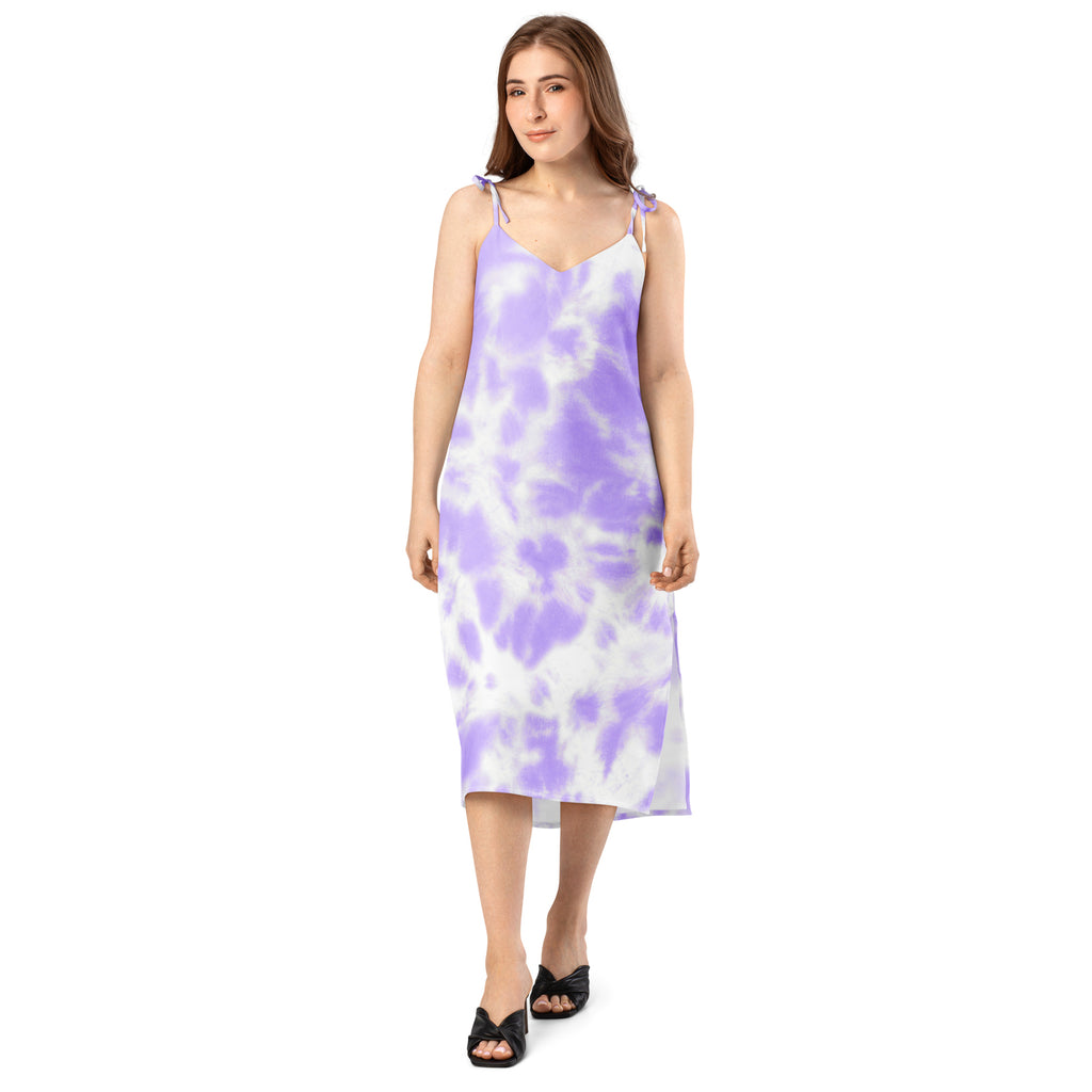 A flowing lavender and white tie dye midi slip dress with delicate adjustable spaghetti straps and built in bra