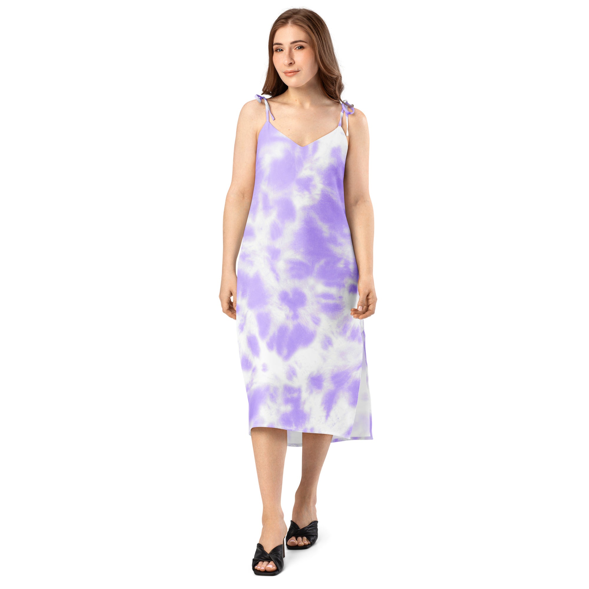 A flowing lavender and white tie dye midi slip dress with delicate adjustable spaghetti straps and built in bra
