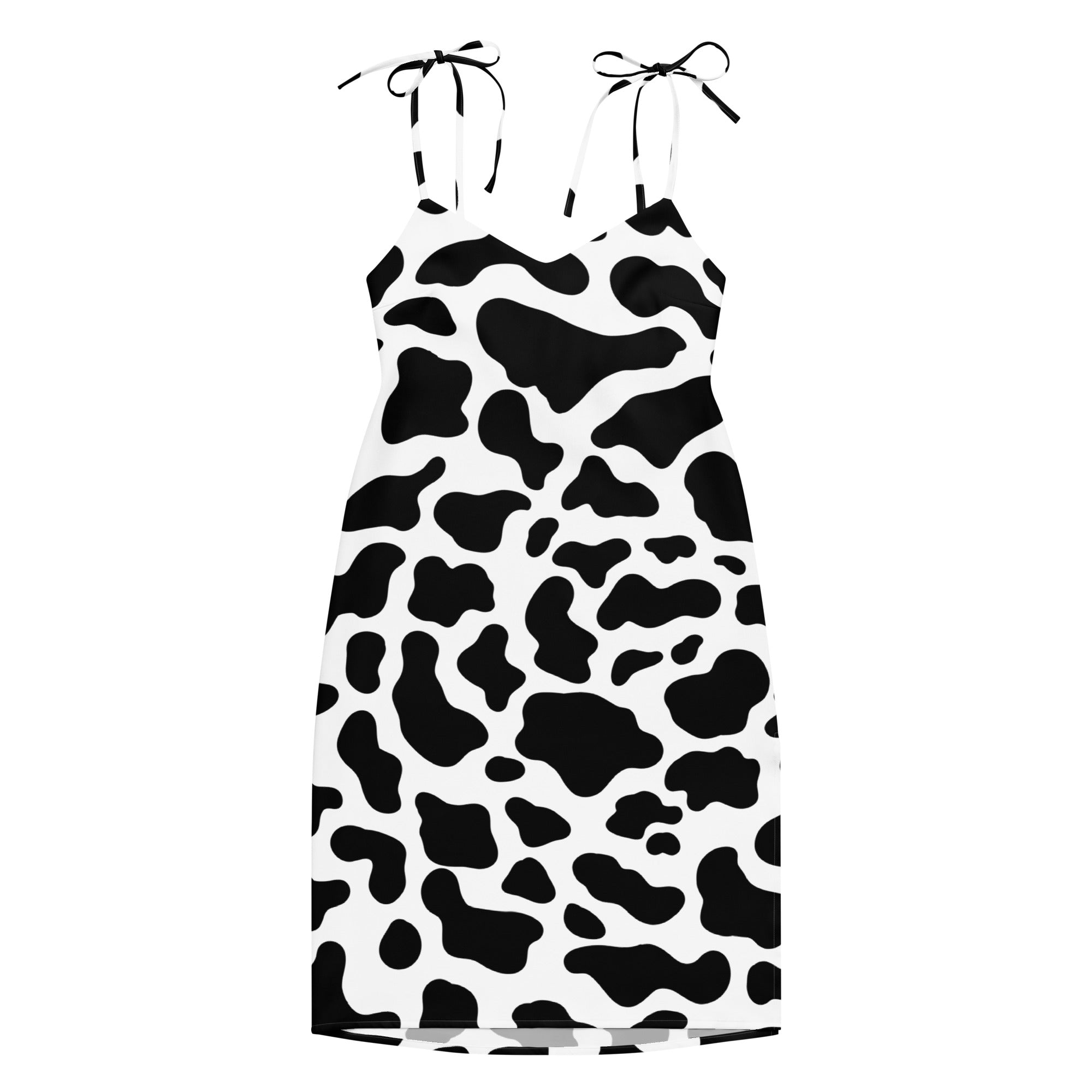 Dress with black and white cow print pattern on a white background