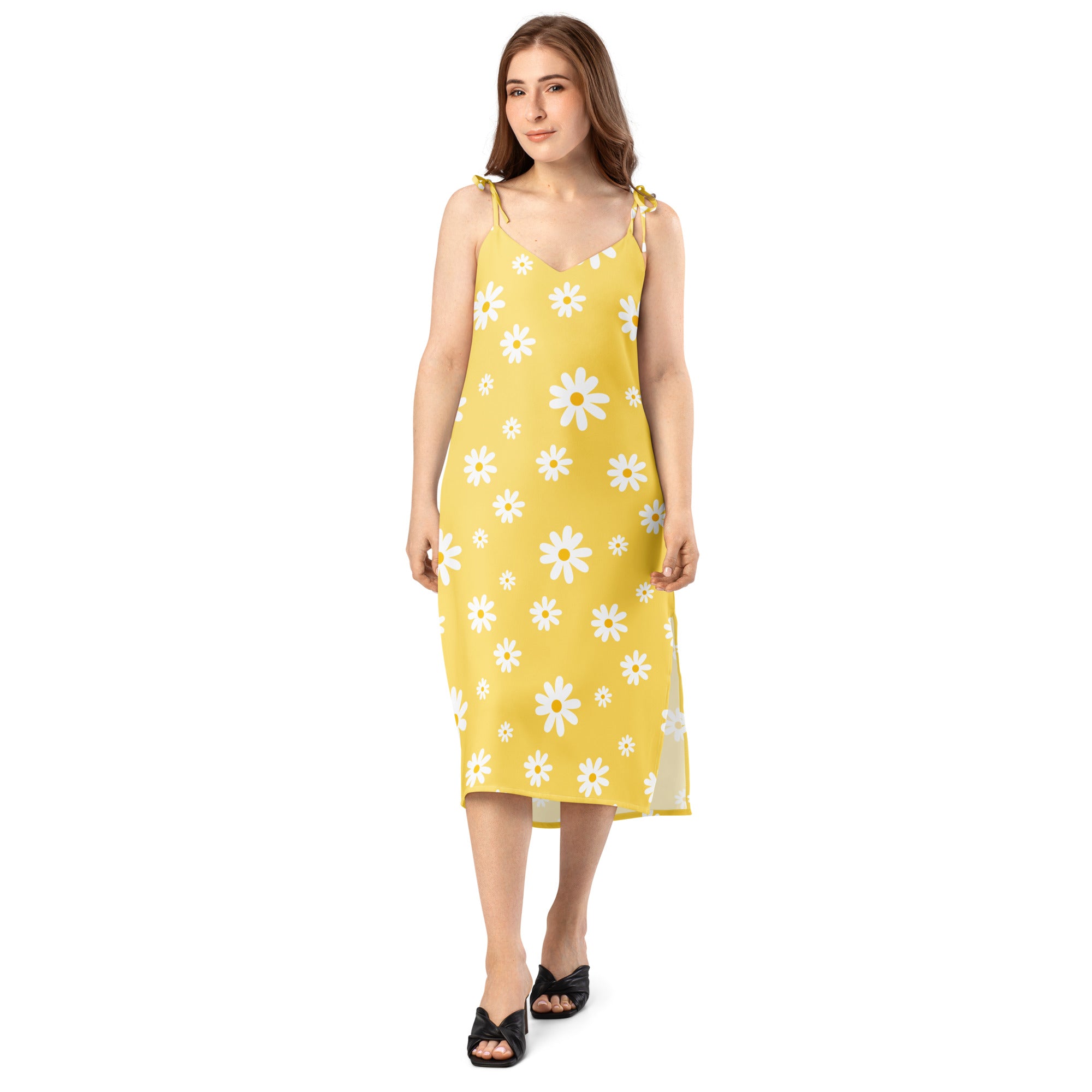 A yellow midi slip dress with white daisy print adjustable tie straps and built in bra for women