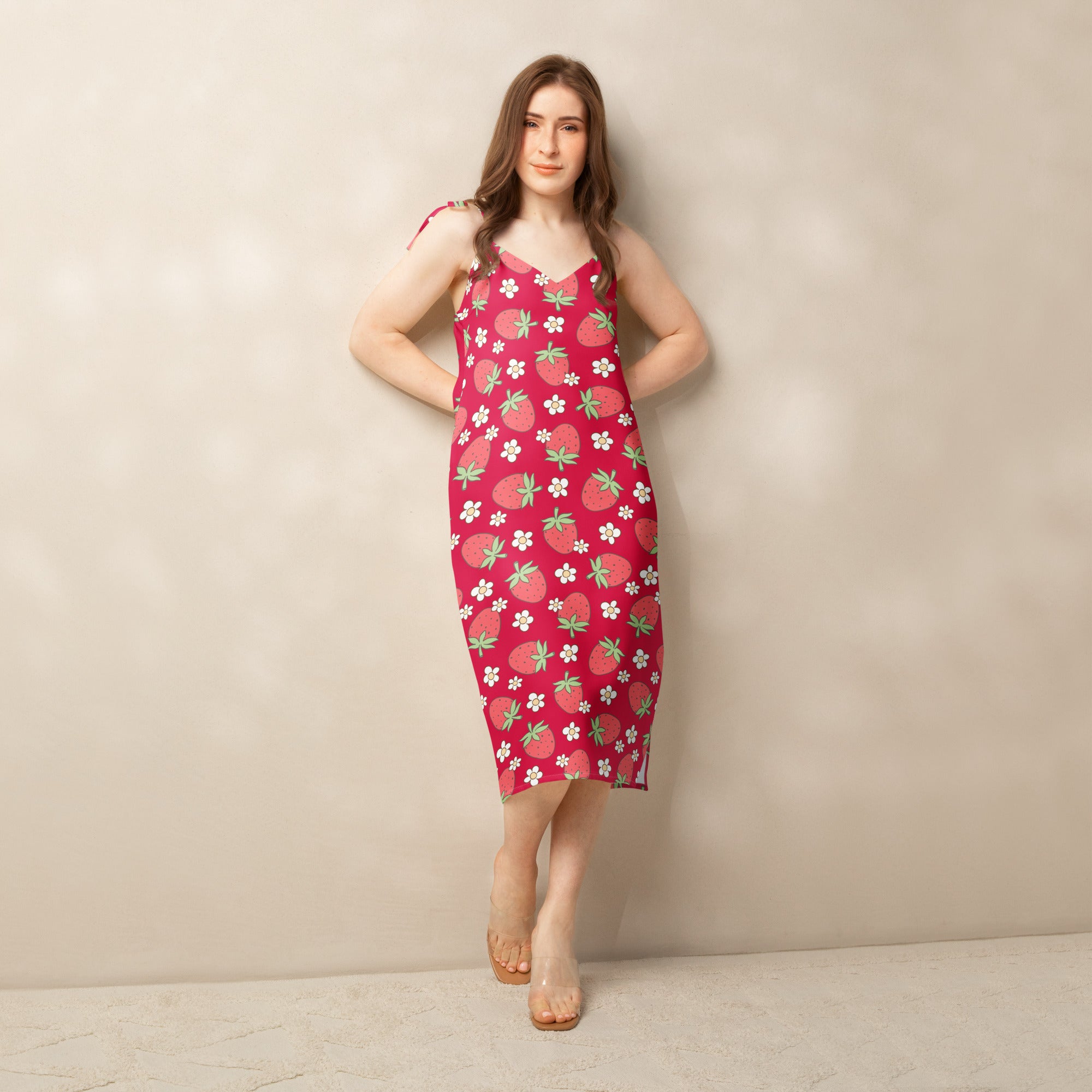 Women’s red strawberry slip midi dress with adjustable tie straps and built in bra featuring vibrant print