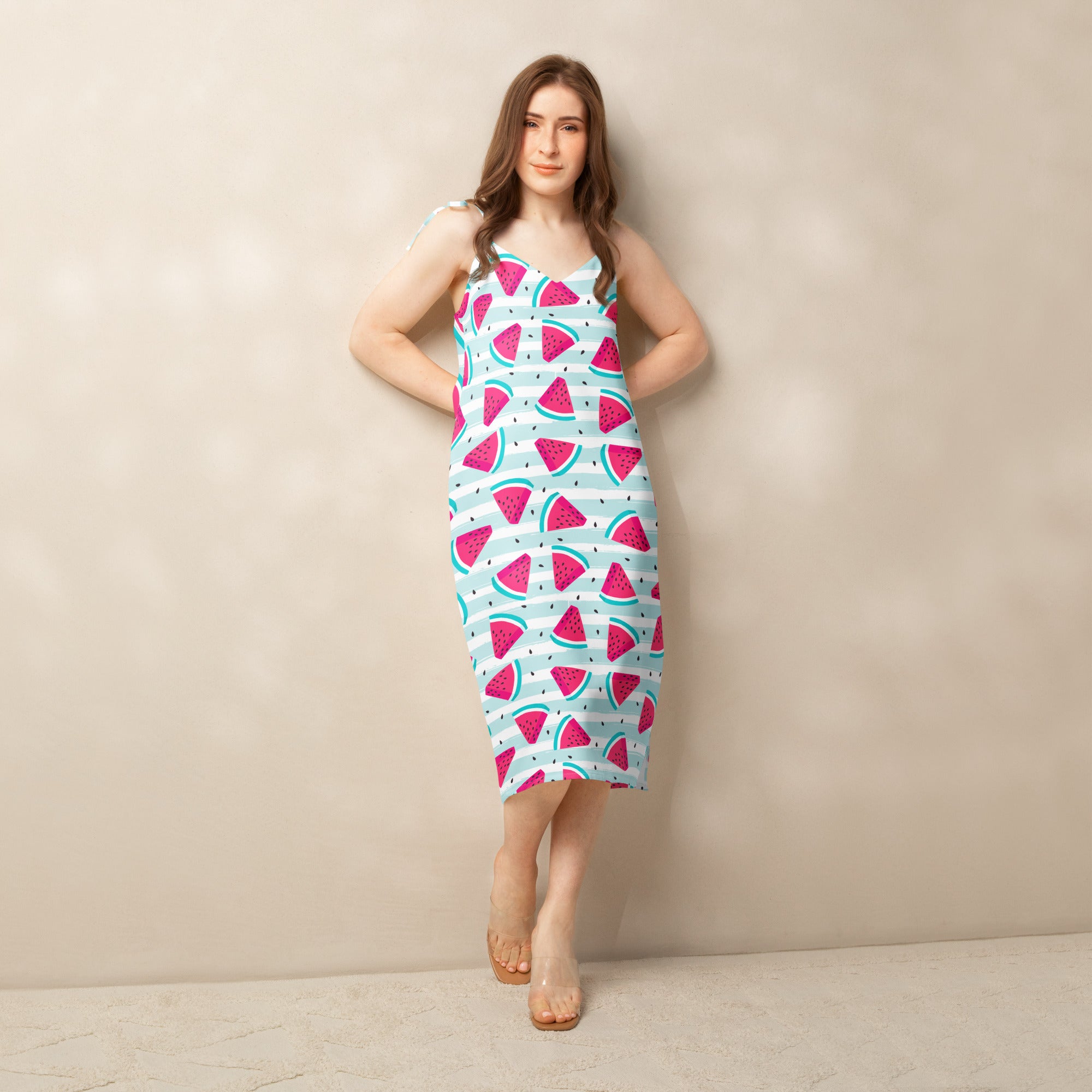 A vibrant light blue midi watermelon stripe slip dress with pink and green accents sleeveless design and built in bra