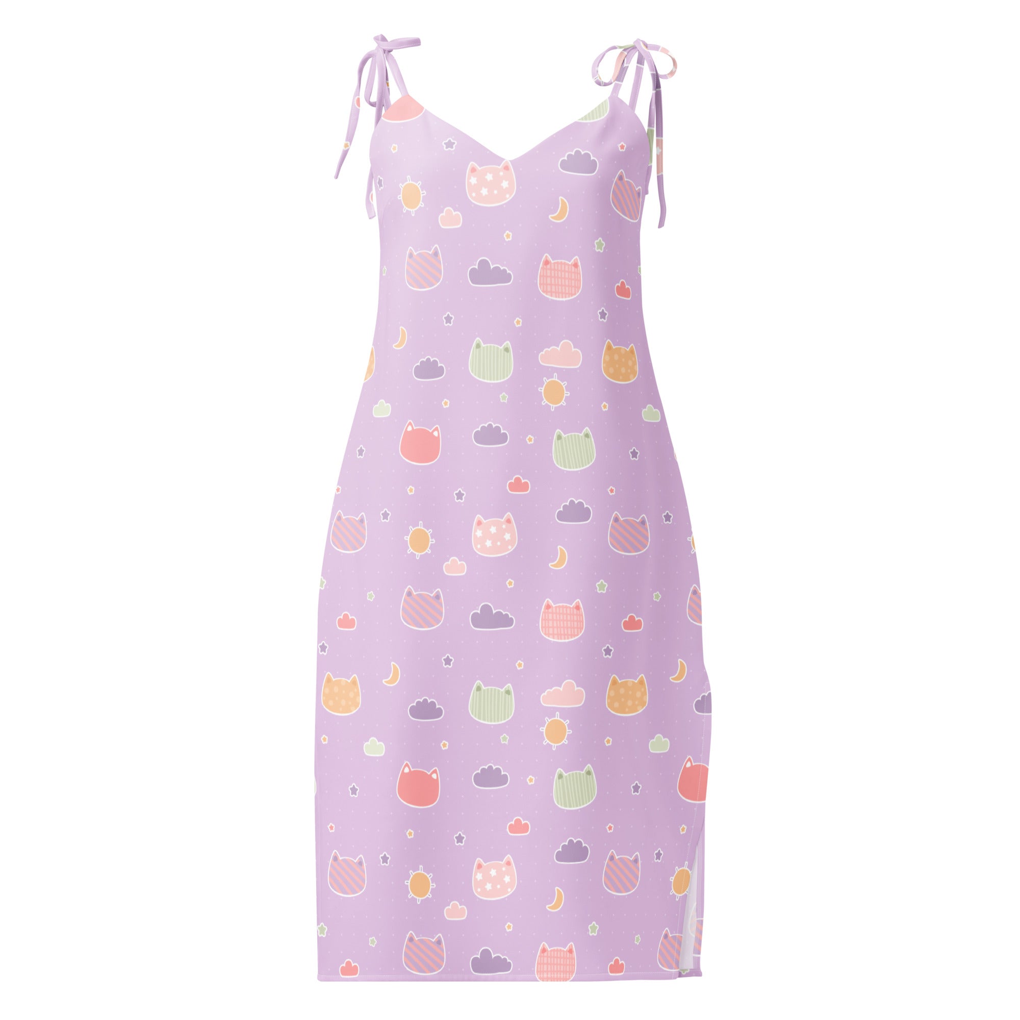 A lavender slip dress with pastel cats clouds moons pattern midi style adjustable tie straps and built in bra