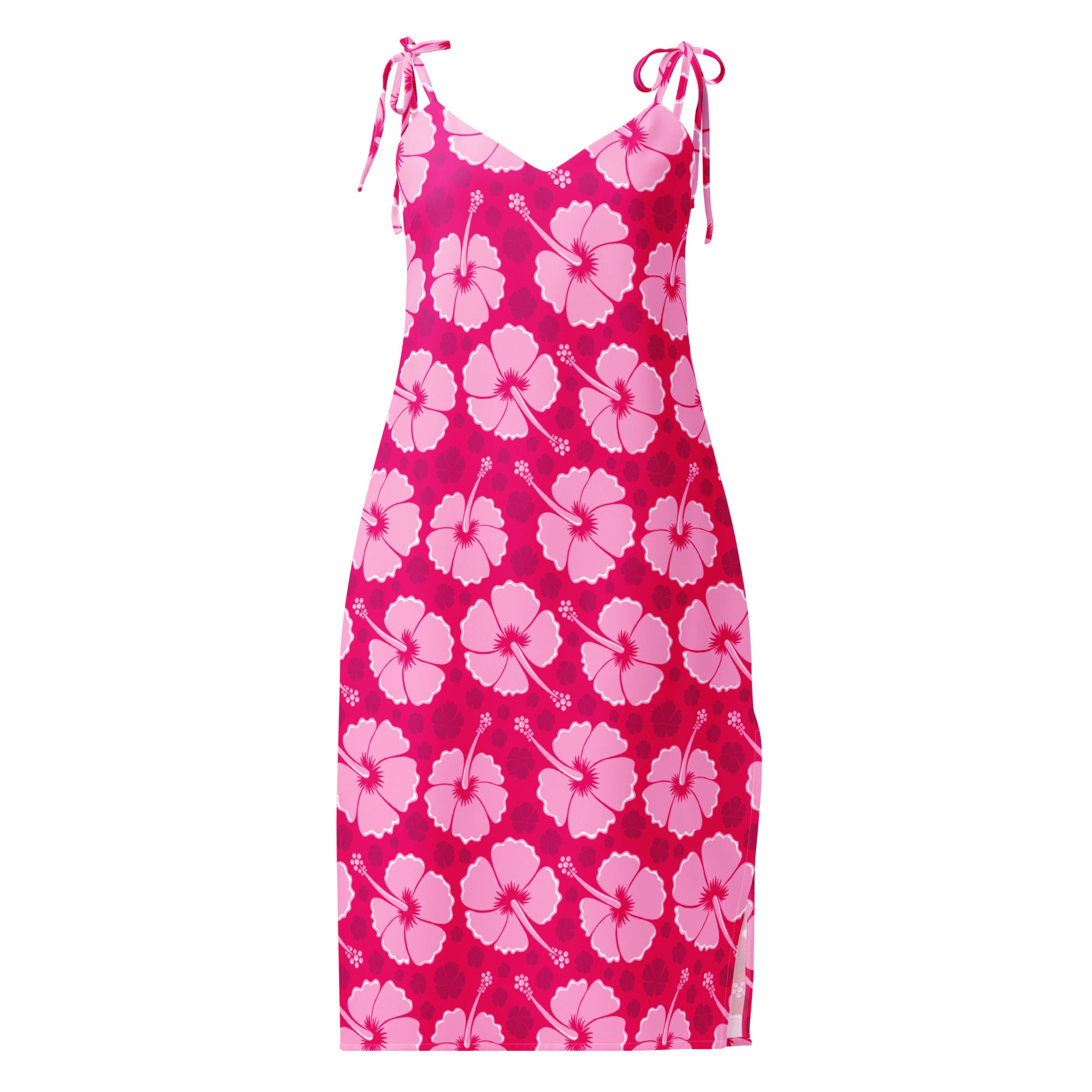 A vibrant pink hibiscus slip dress with adjustable tie straps and side slit perfect for tropical summer wear