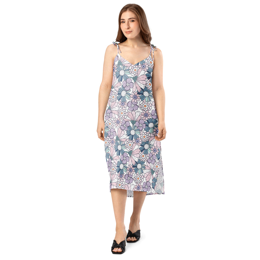 Women’s pastel floral slip midi dress with adjustable tie straps and built in bra in soft lavender teal and white
