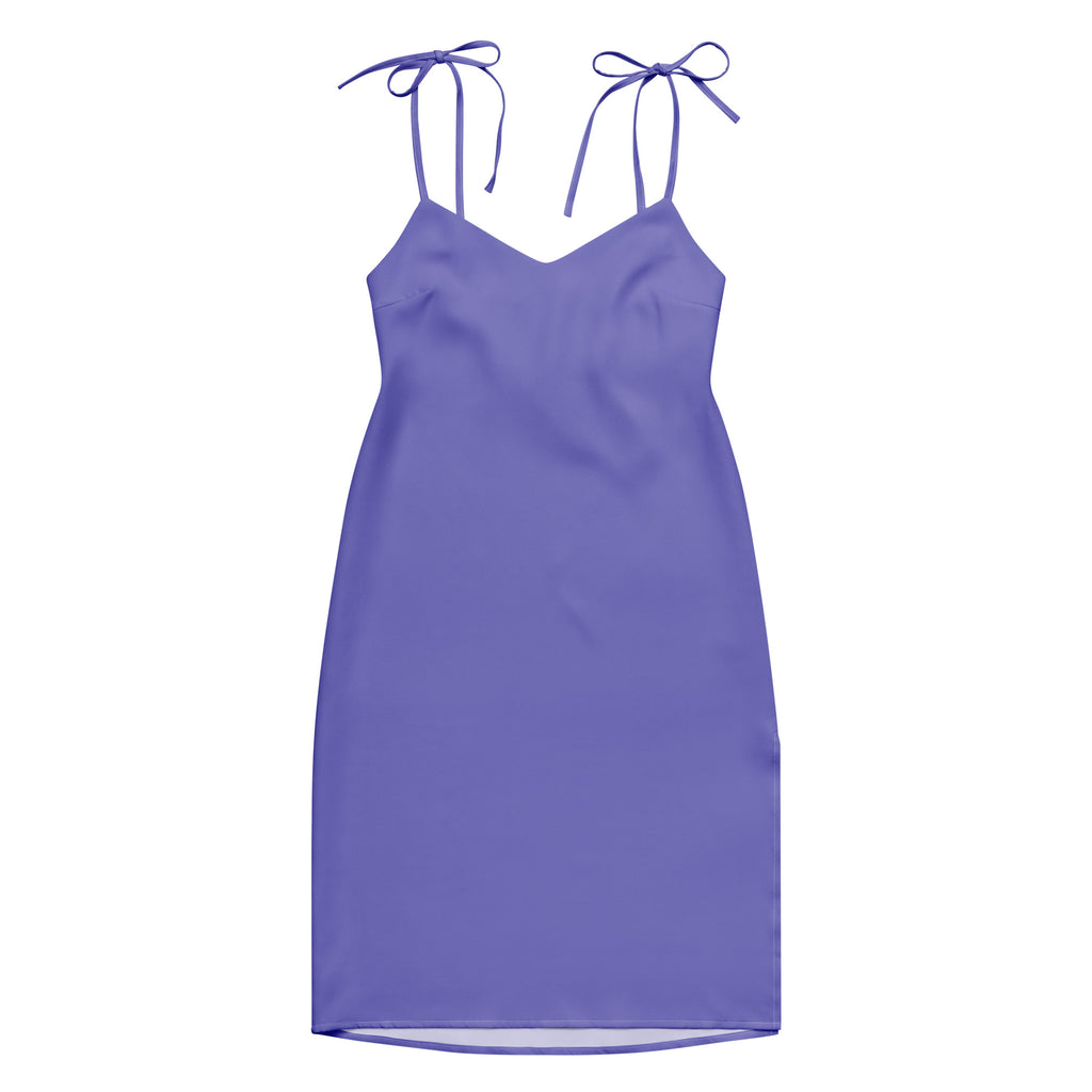 Purple slip dress with thin straps on a white background
