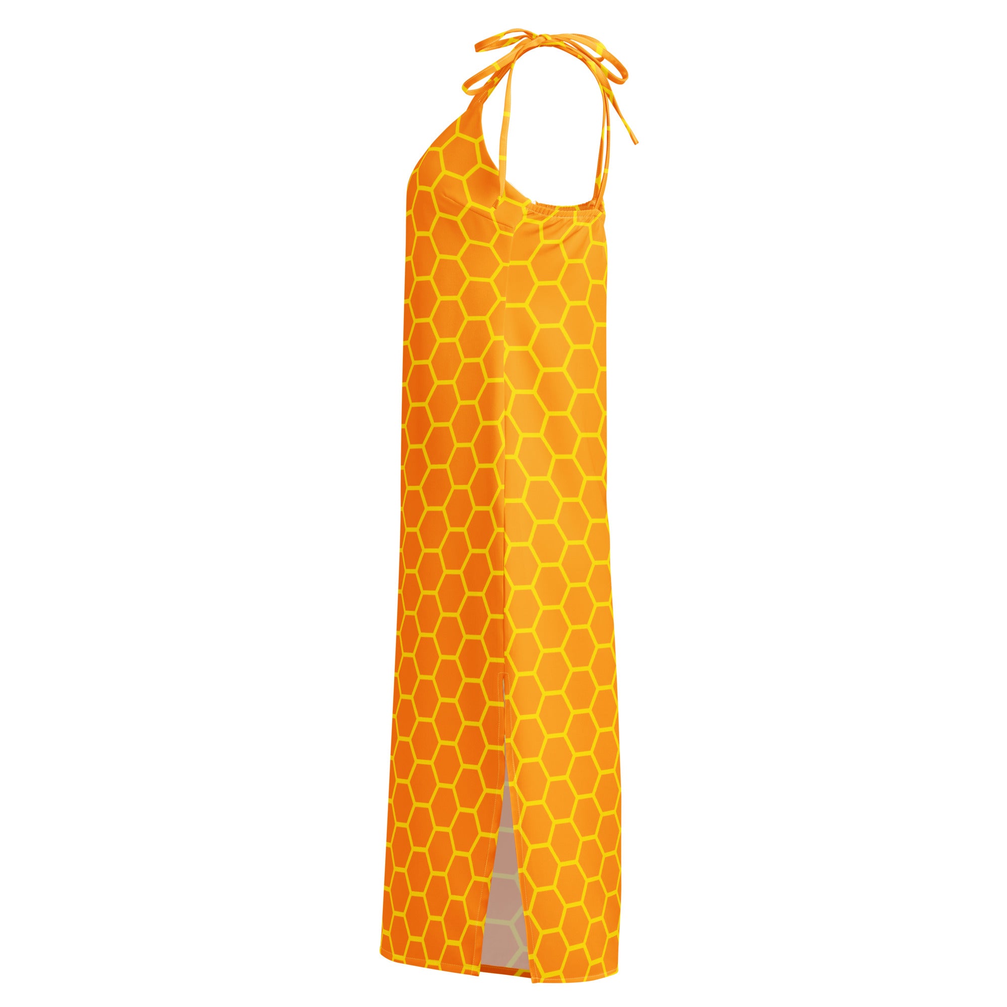 A vibrant orange halter-neck maxi dress with a bold honeycomb pattern and adjustable tie straps