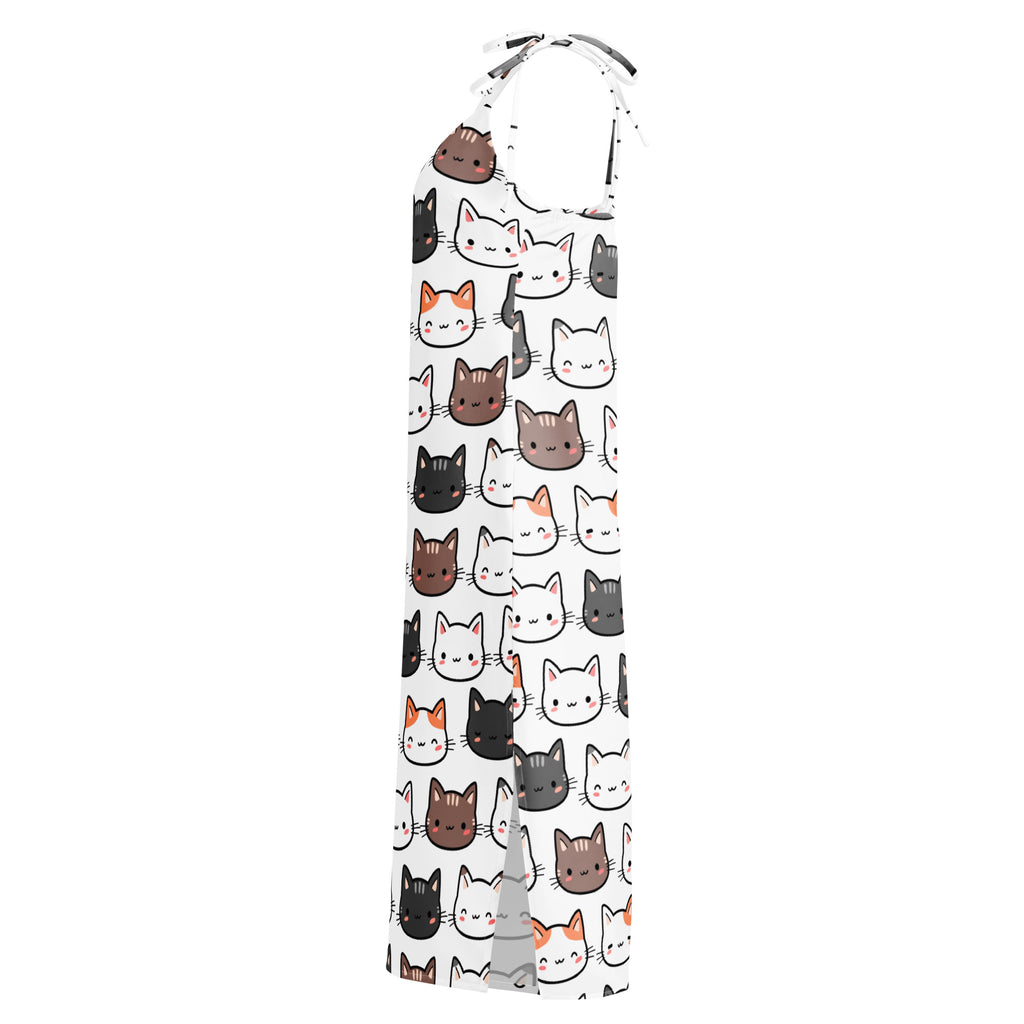 Women’s white halter-neck midi slip dress with adjustable tie straps and playful multicolor cartoon cat faces pattern