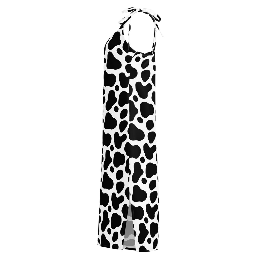 Black and white cow print dress on a white background