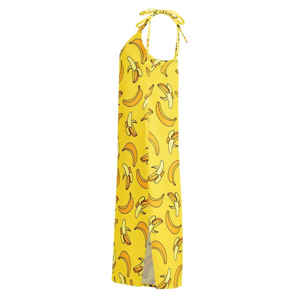 Yellow dress with banana pattern on a white background