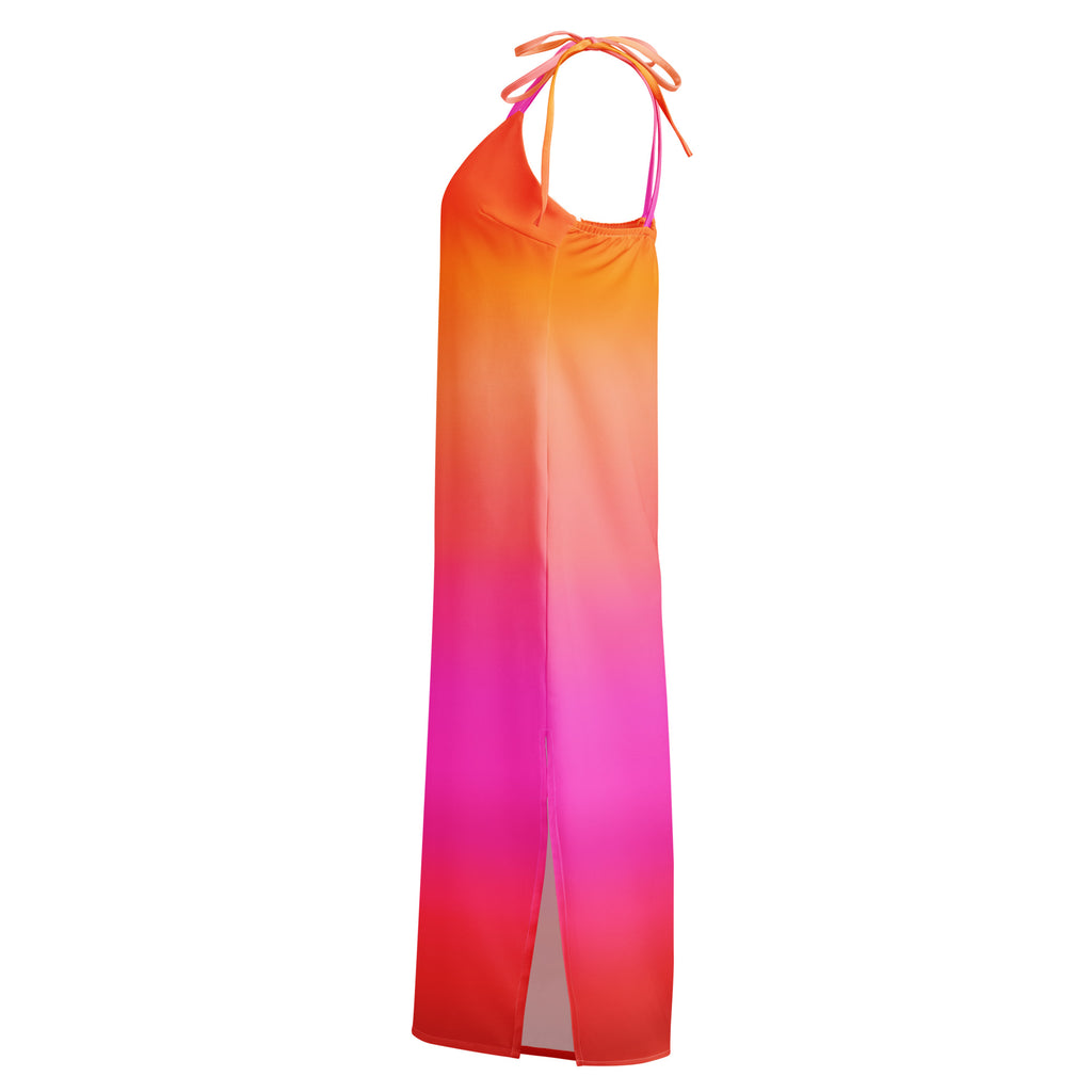A vibrant orange pink and red gradient women’s sunset ombre midi slip dress with adjustable tie halter straps and built in bra
