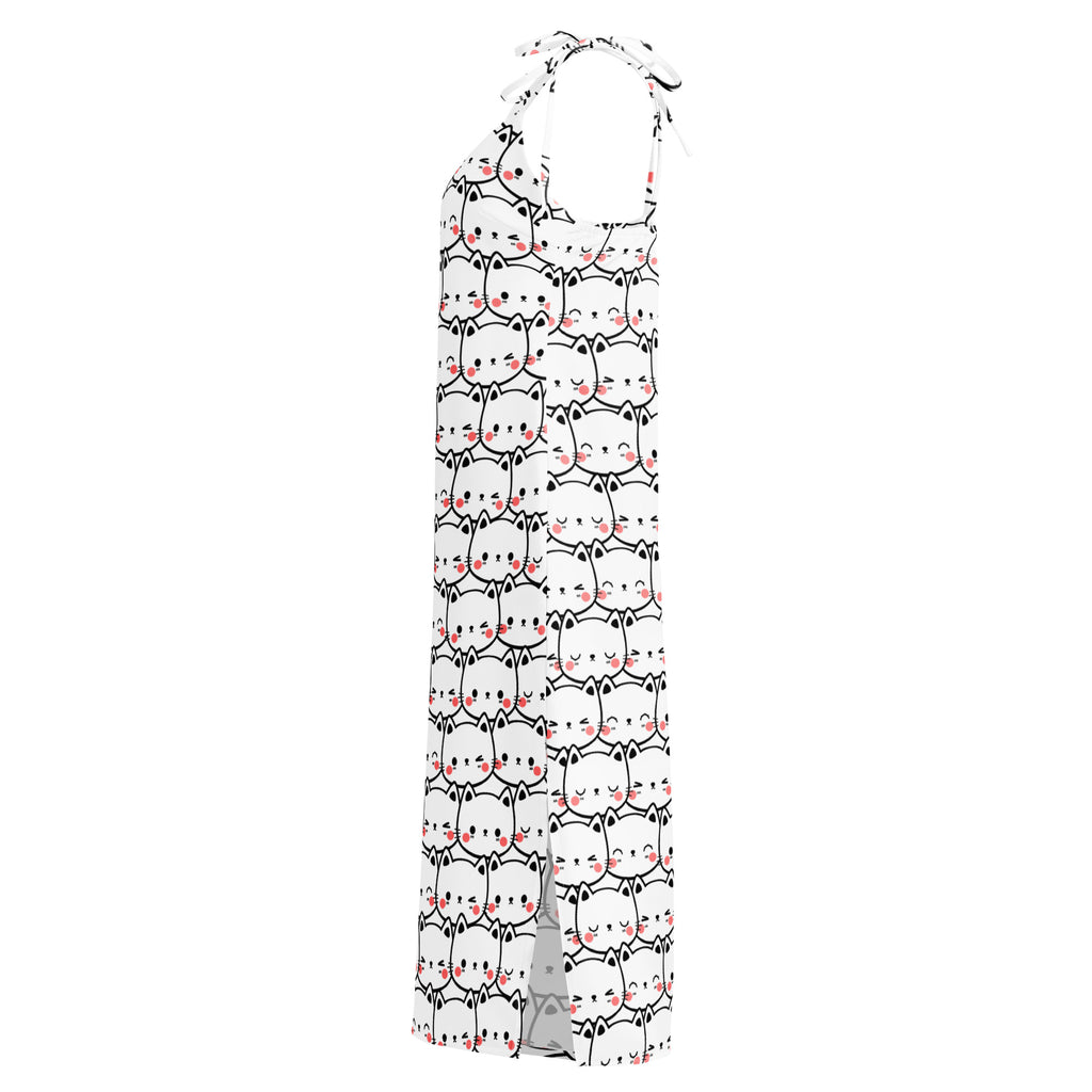 White halter neck maxi dress with black outlined cartoon cats and pink blush cheeks featuring adjustable tie straps and built in bra