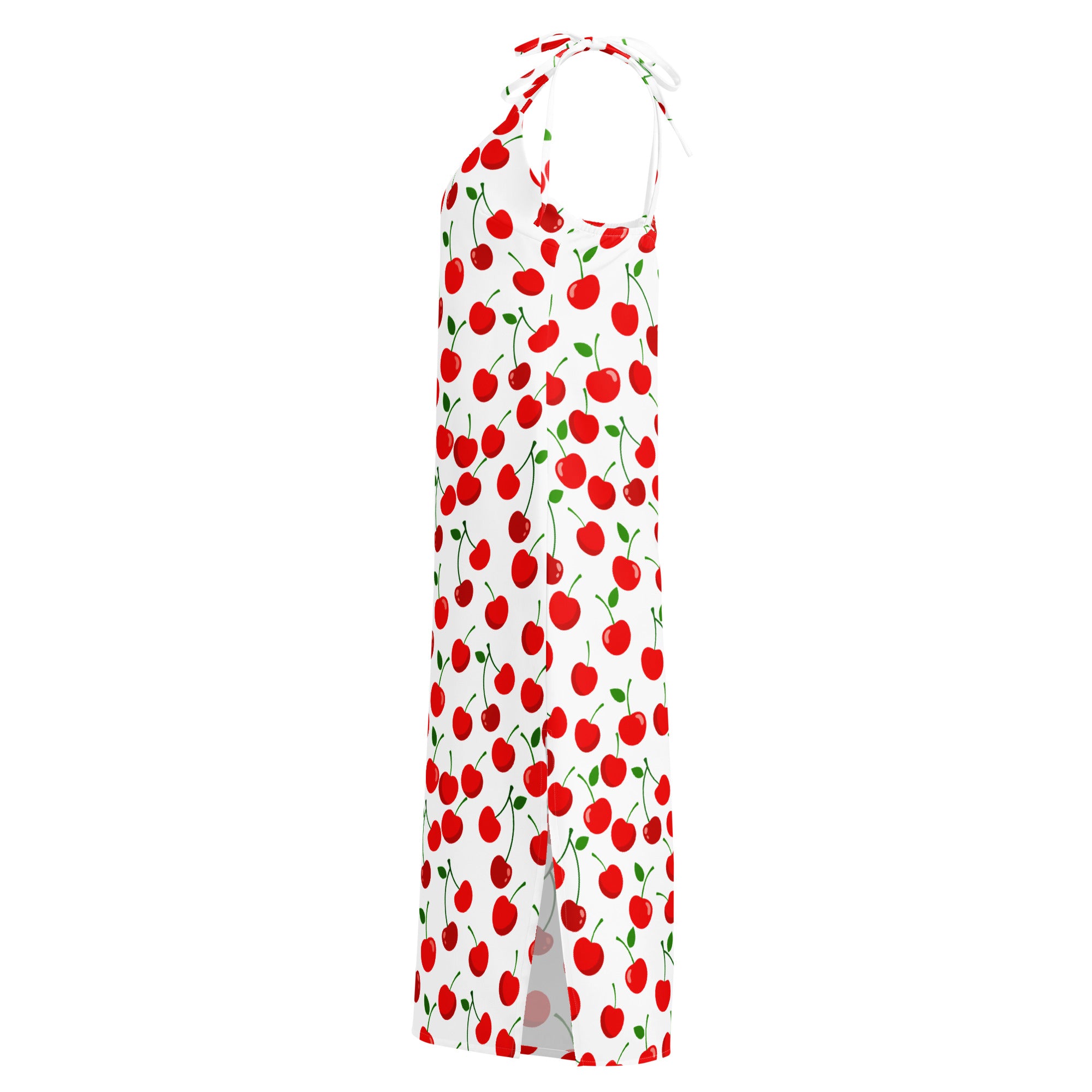 A white midi slip dress with red cherry print green stems adjustable tie straps and a built in bra featuring a side slit