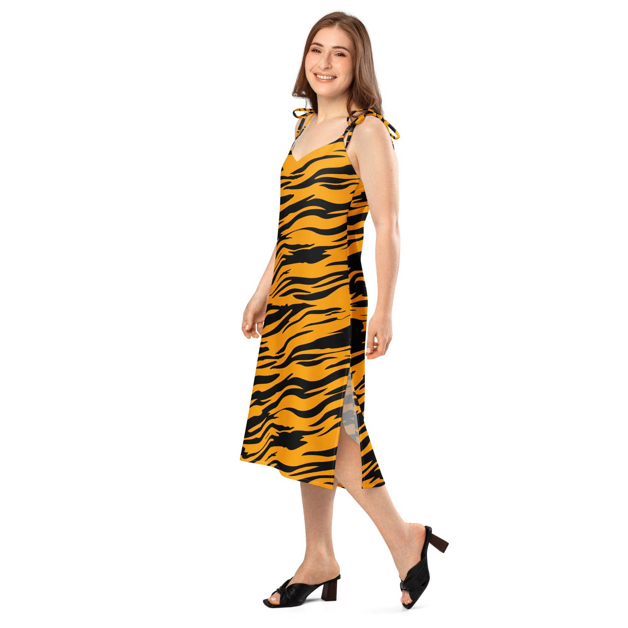 A vibrant yellow and black tiger stripe midi slip dress with adjustable tie straps and built in bra for women