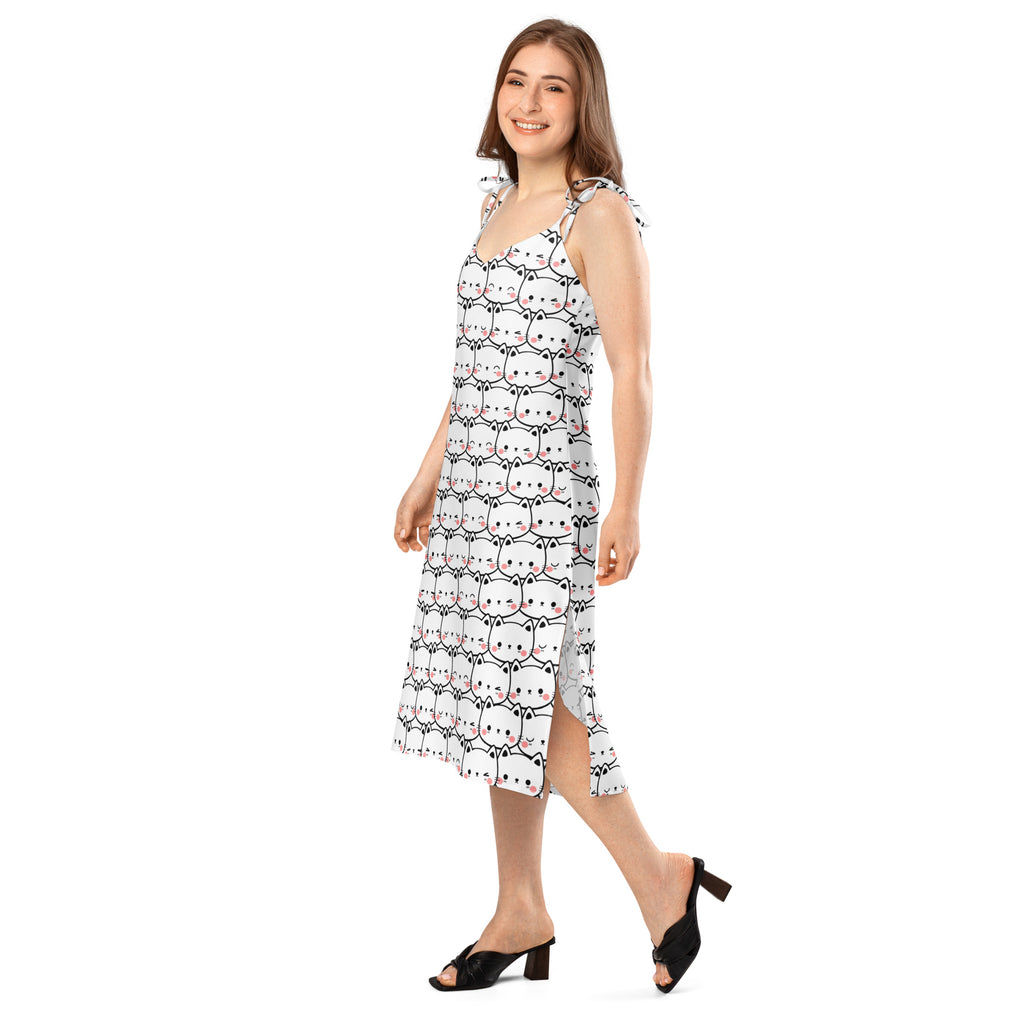 White midi slip dress with black outlined cartoon cats pink blush cheeks thin adjustable tie straps and built in bra