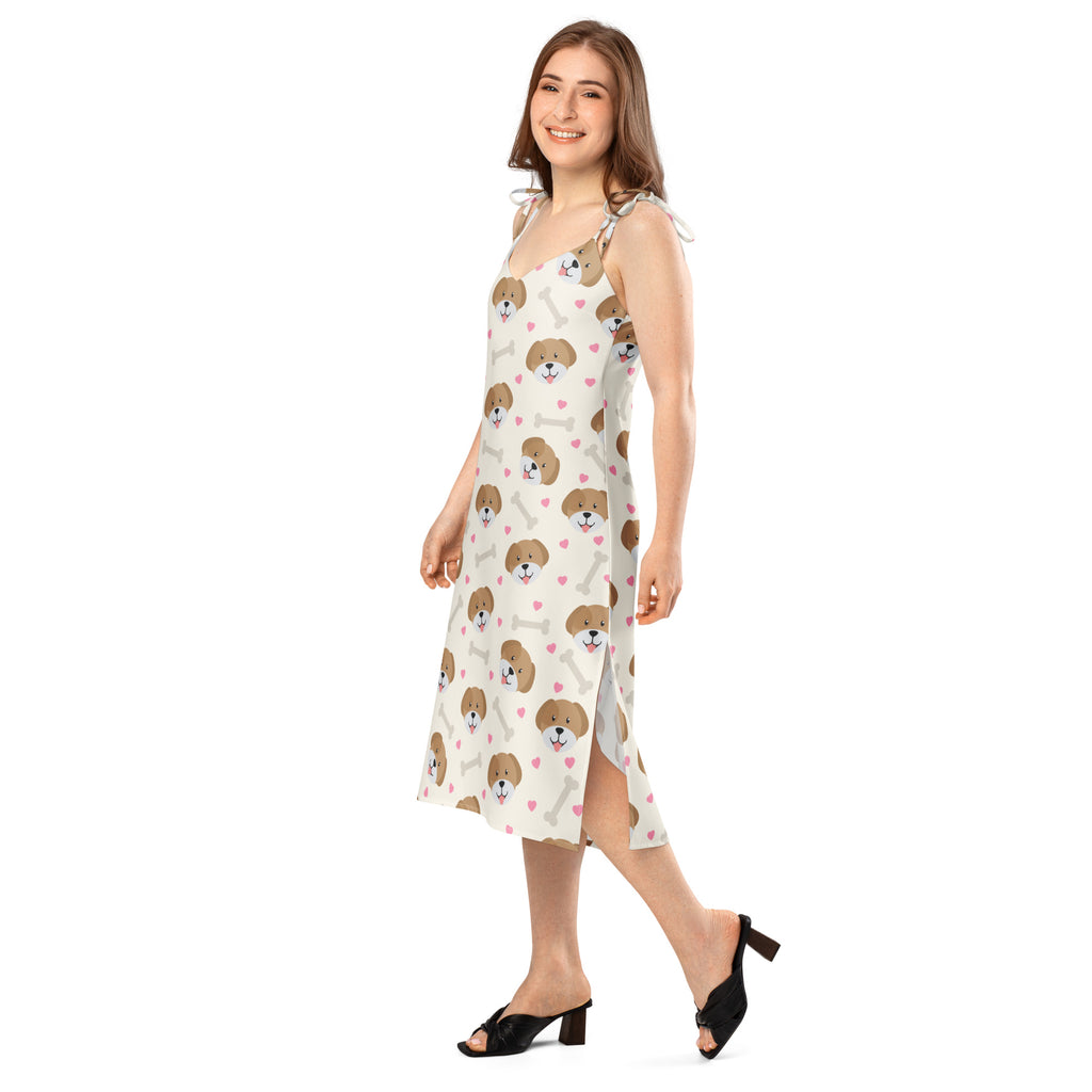 White sleeveless midi slip dress with adjustable tie straps and built-in bra featuring brown puppy faces and pink hearts pattern