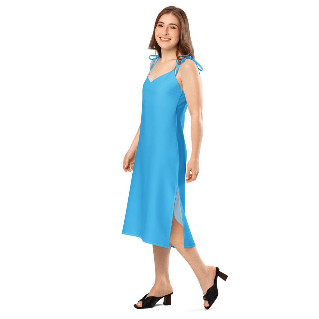 Women's sky blue slip dress with adjustable tie straps and built-in bra, midi length with side slit