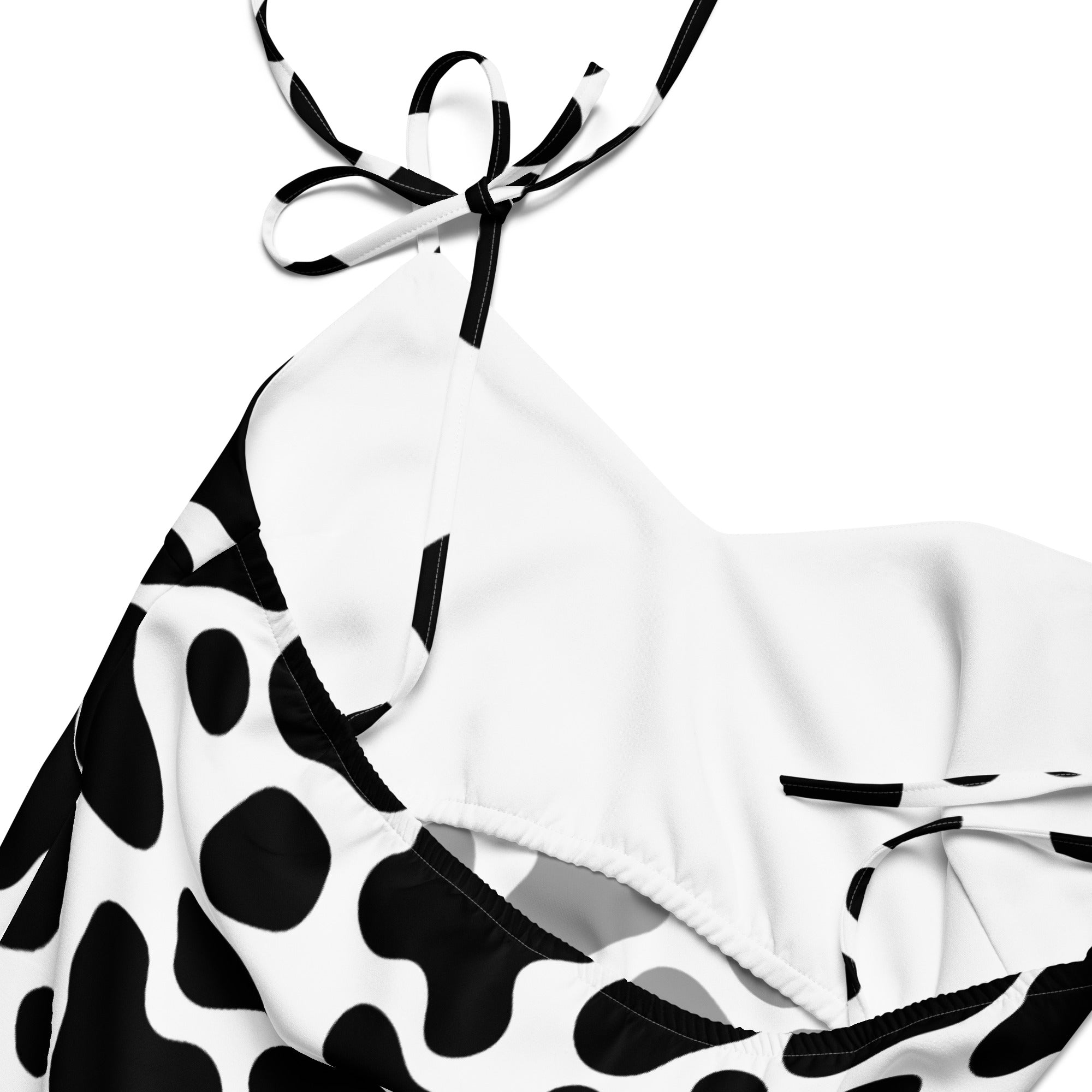 White halter top bikini with black cow print and matching striped tie straps for a women’s slip dress midi look