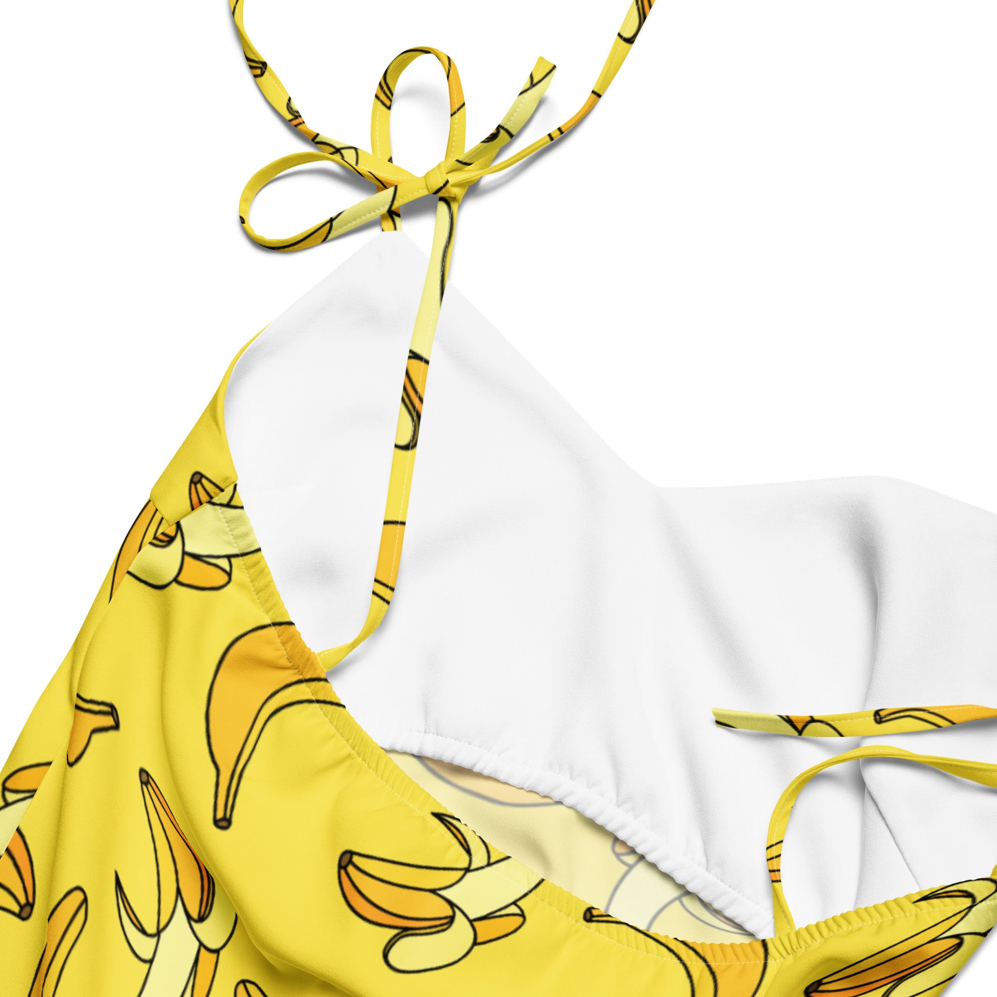 Yellow dress with banana print on a white background