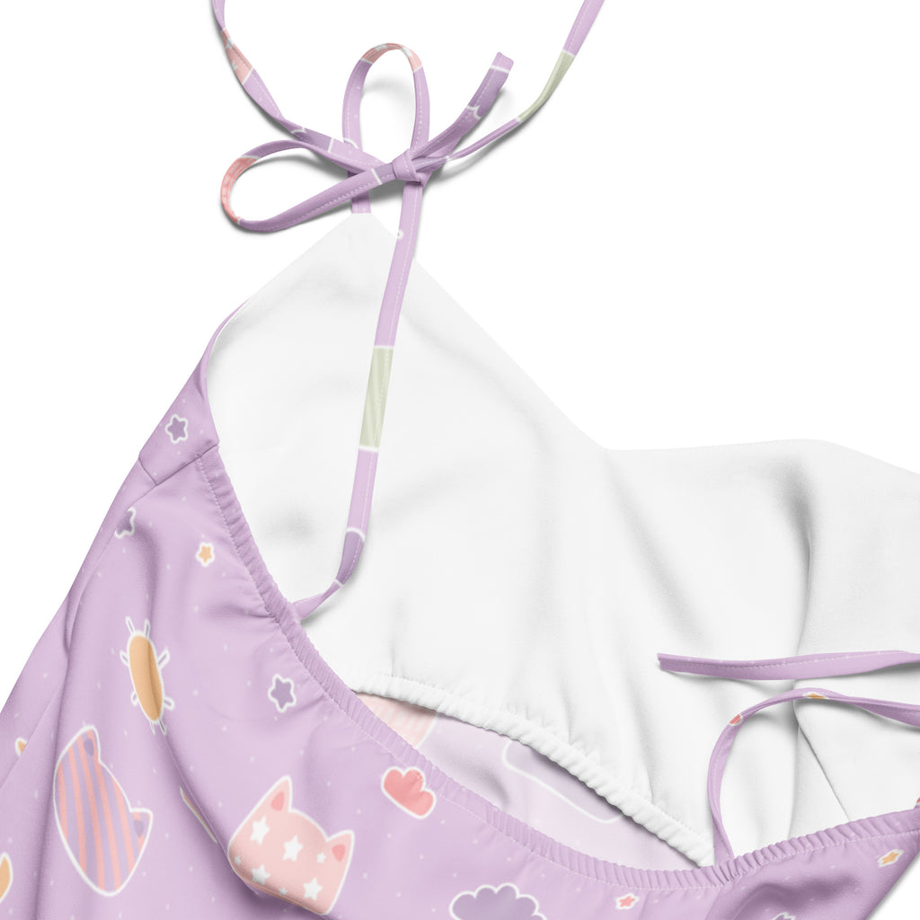 Lavender bikini top with adjustable ties soft fabric and playful cat and star pattern matching pastel purple slip dress
