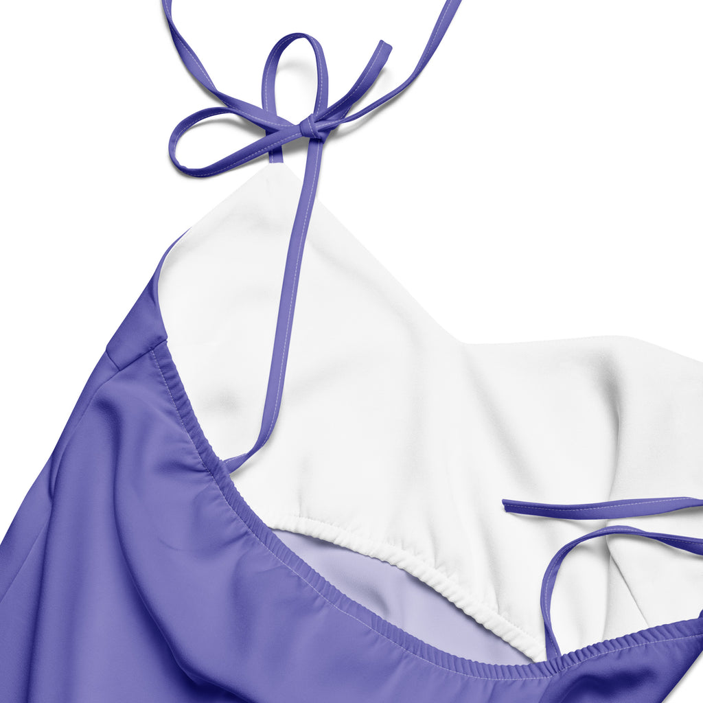 Purple dress with thin straps on a white background