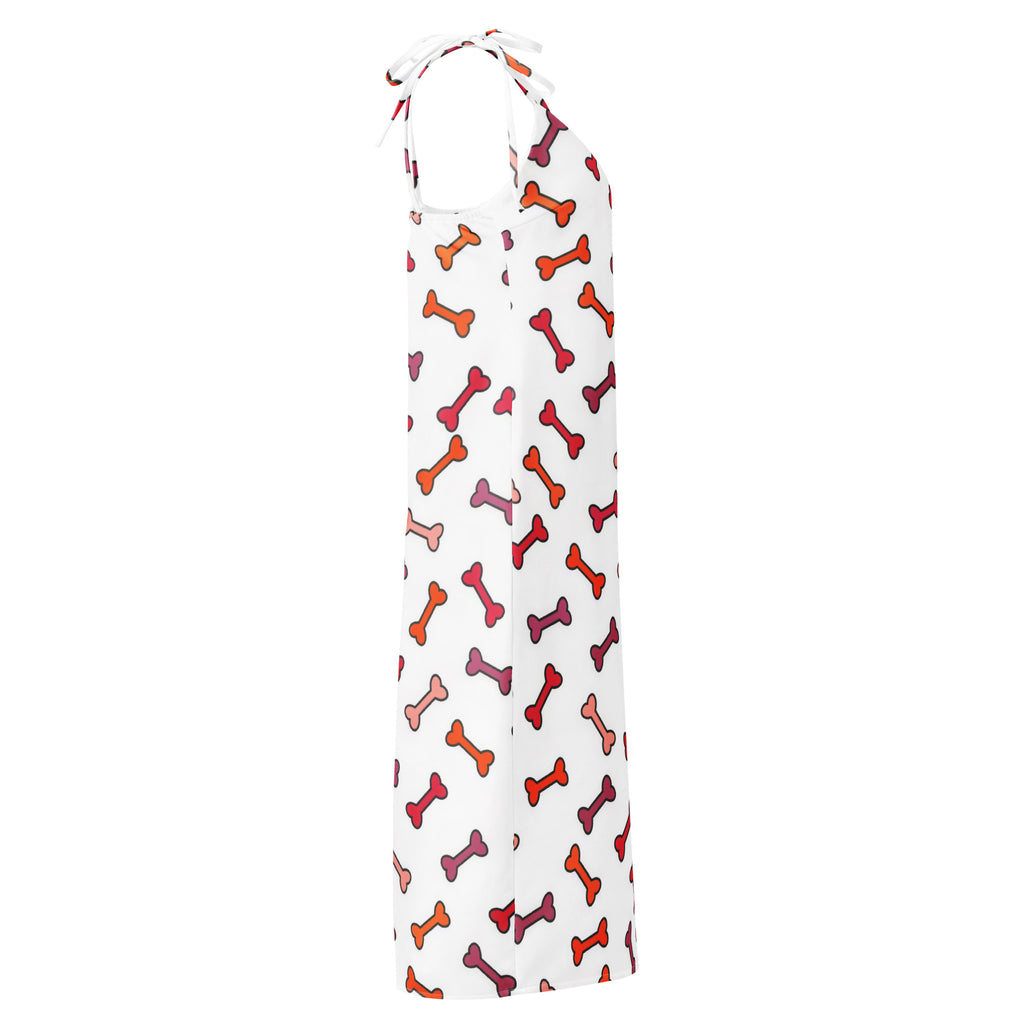 White halter-neck midi slip dress with colorful orange red and pink bone pattern and adjustable tie straps with bra