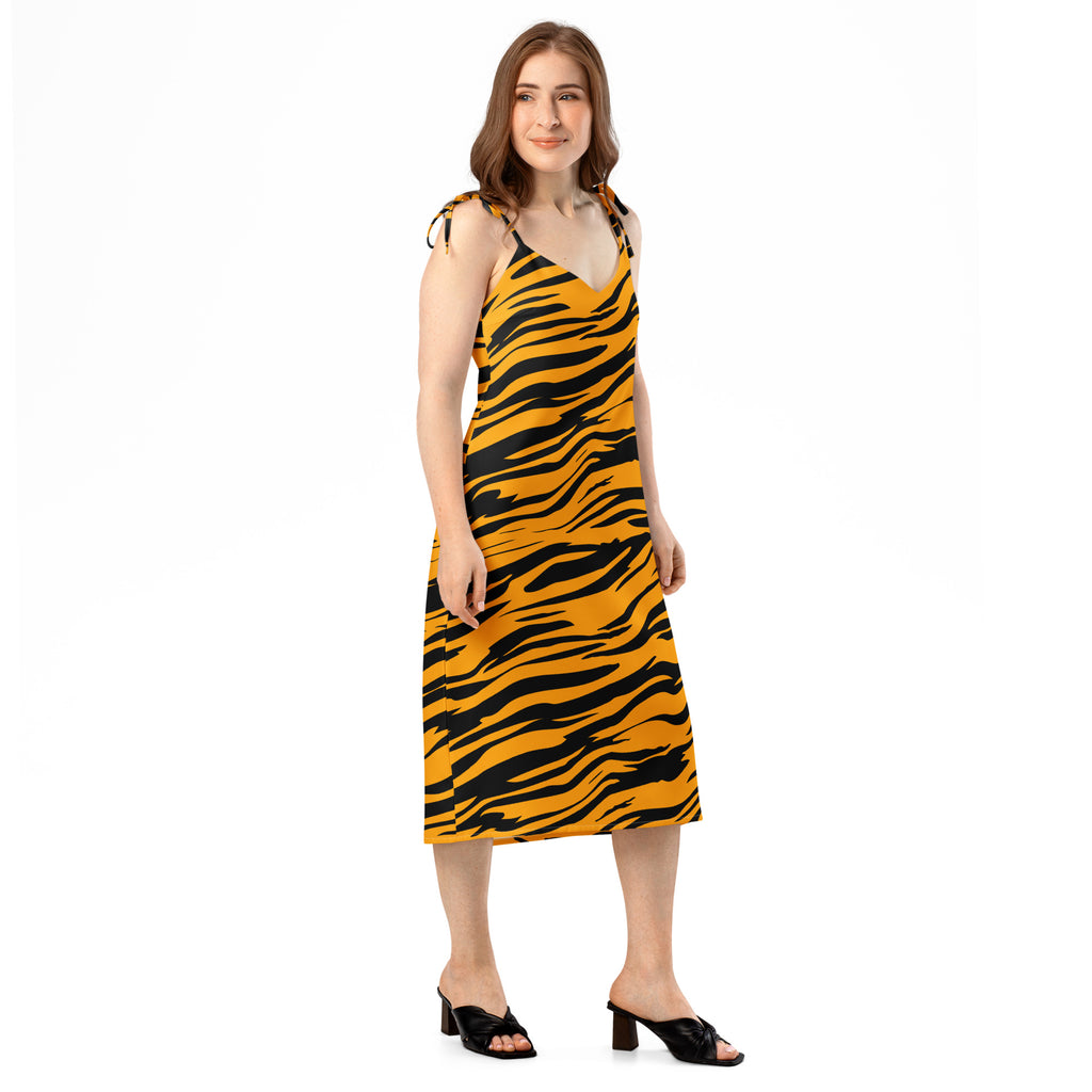 A vibrant yellow and black tiger stripe slip midi dress with adjustable tie straps and built in bra for women