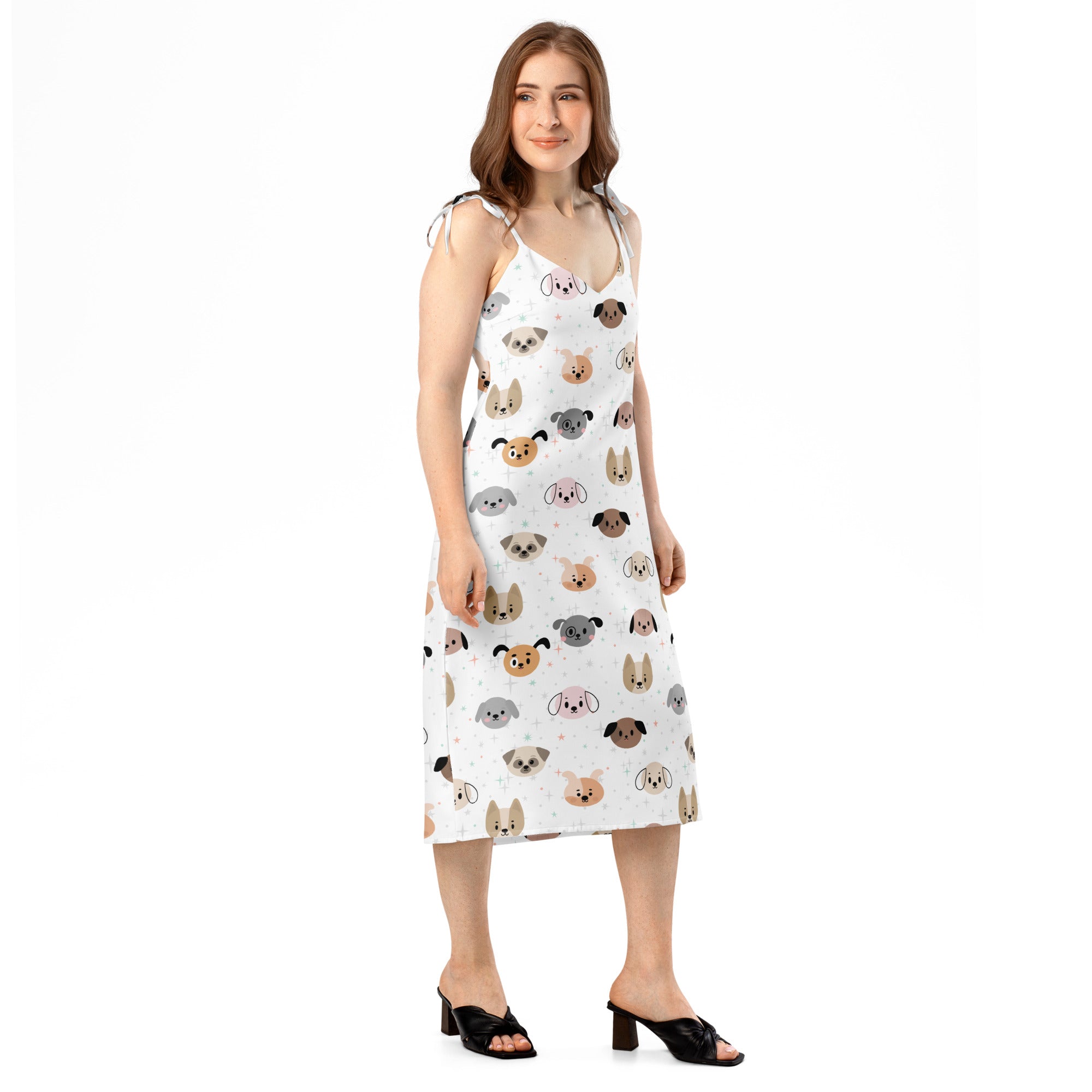 Women’s white sleeveless midi slip dress with playful cartoon dog pattern and adjustable tie straps with built in bra