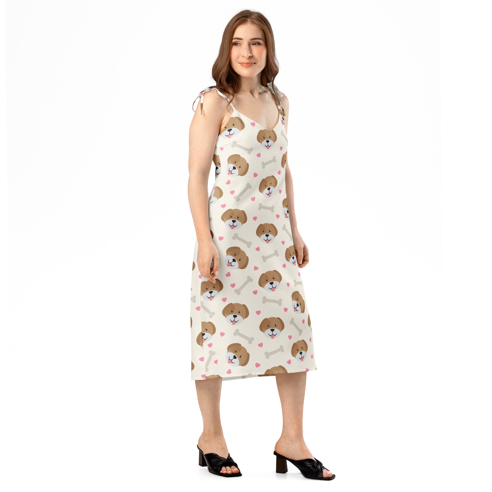 White sleeveless midi slip dress with playful brown puppy faces bones pink hearts print and adjustable tie straps