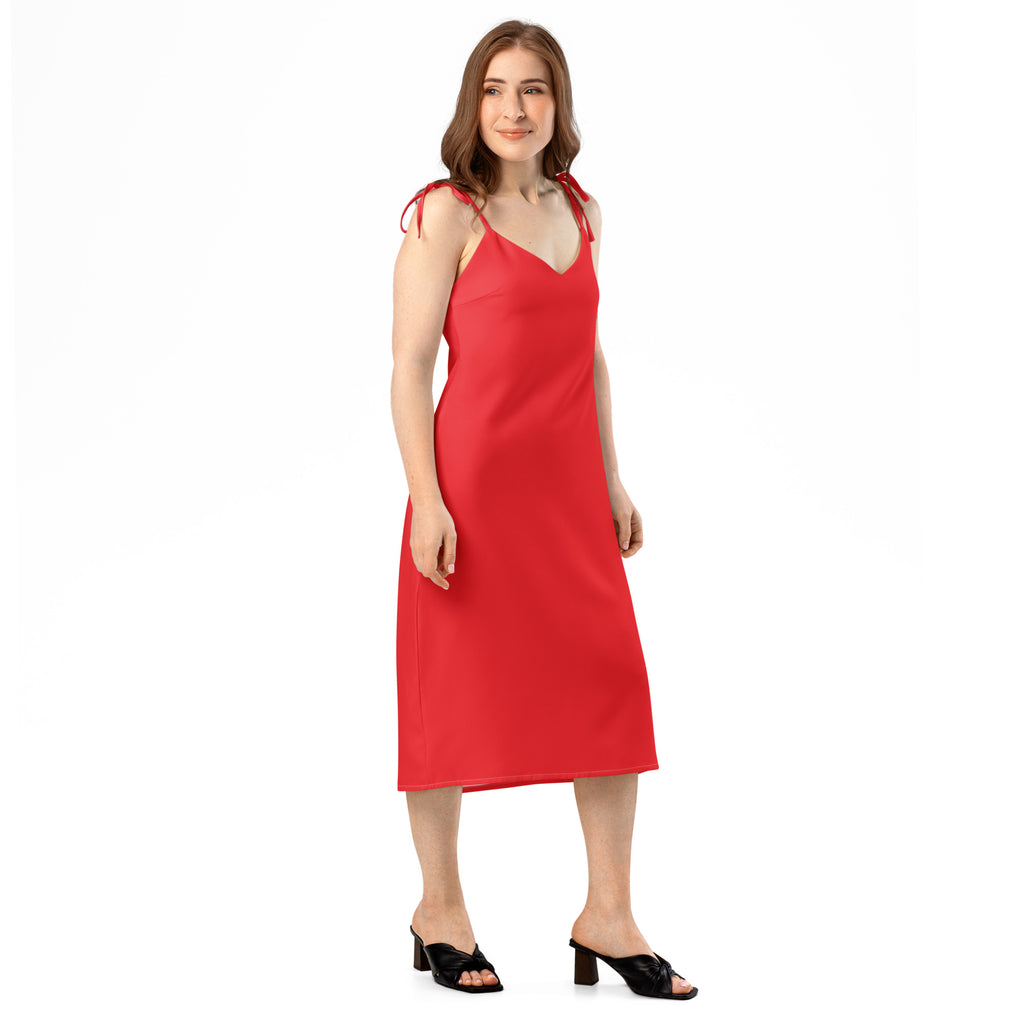 Woman wearing a red dress on a white background