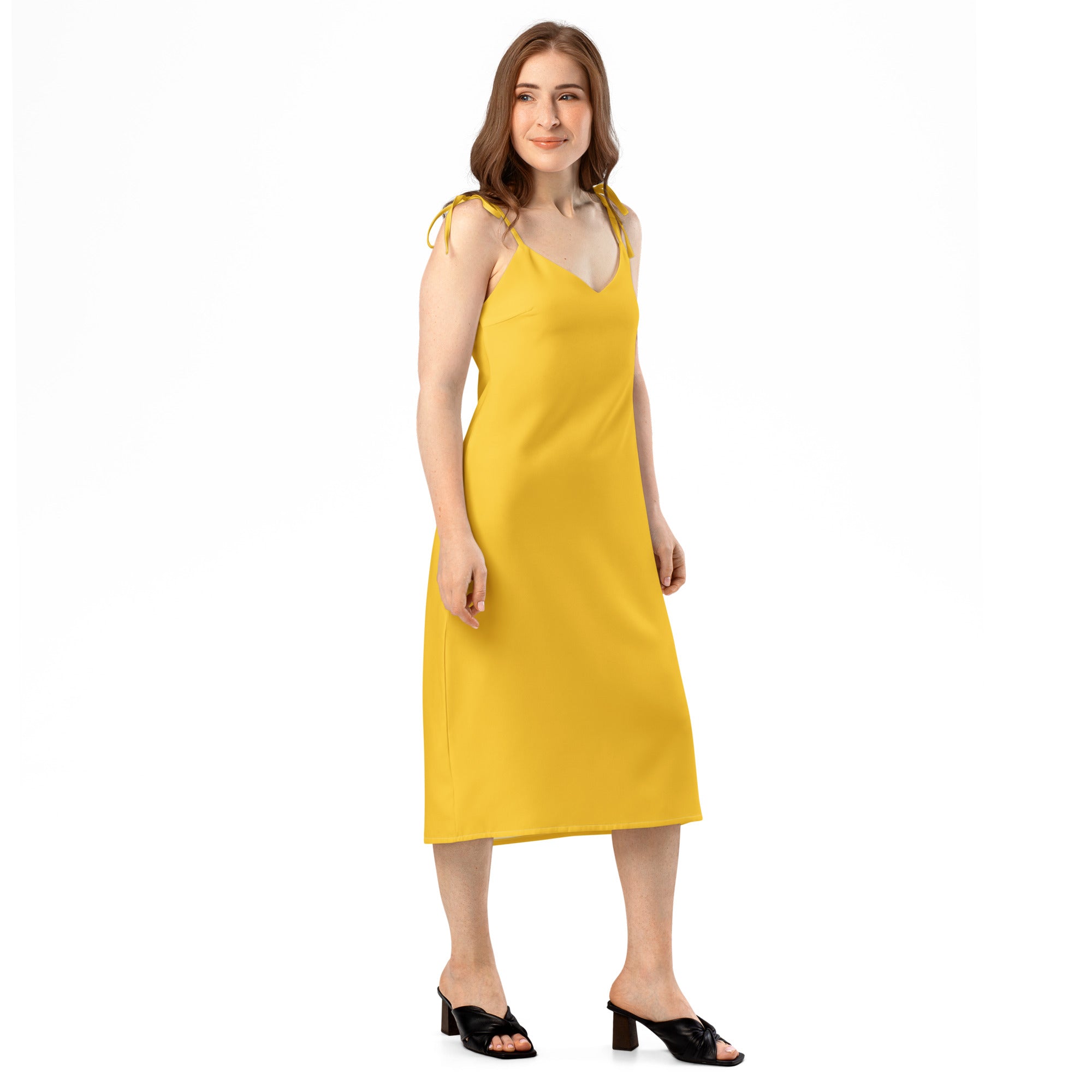 Women's yellow midi slip dress with adjustable tie straps and built-in bra