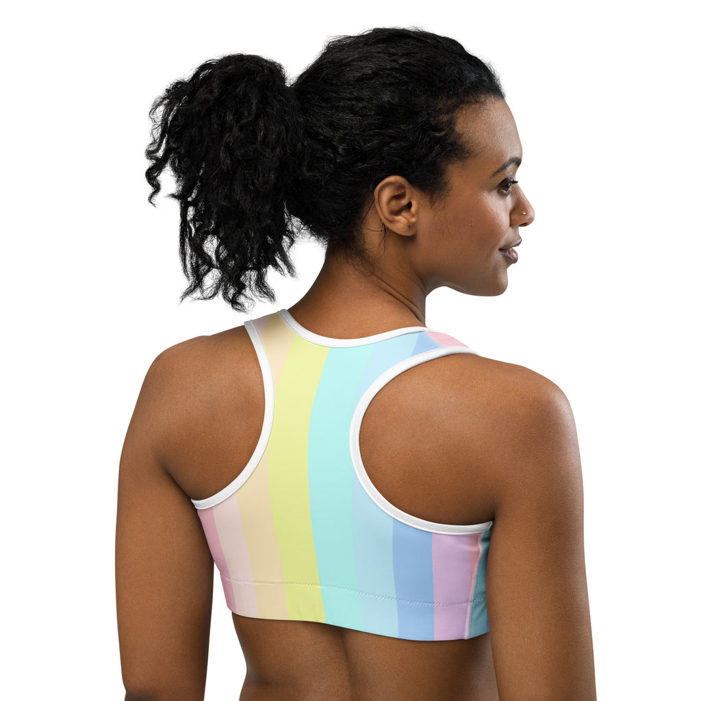 Women’s pastel rainbow stripe quick drying sports bra with white trim in breathable fabric for active wear