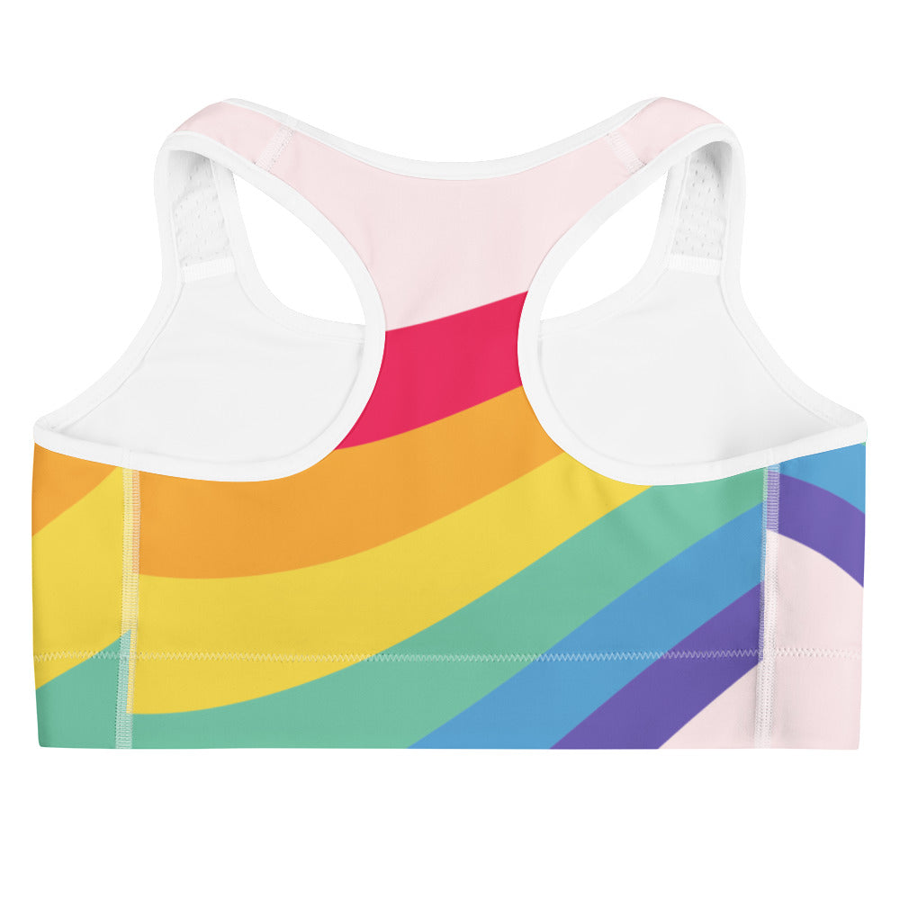 Women’s rainbow wave lgbtq quick drying sports bra with rainbow stripes pastel pink and white trim for athletic use
