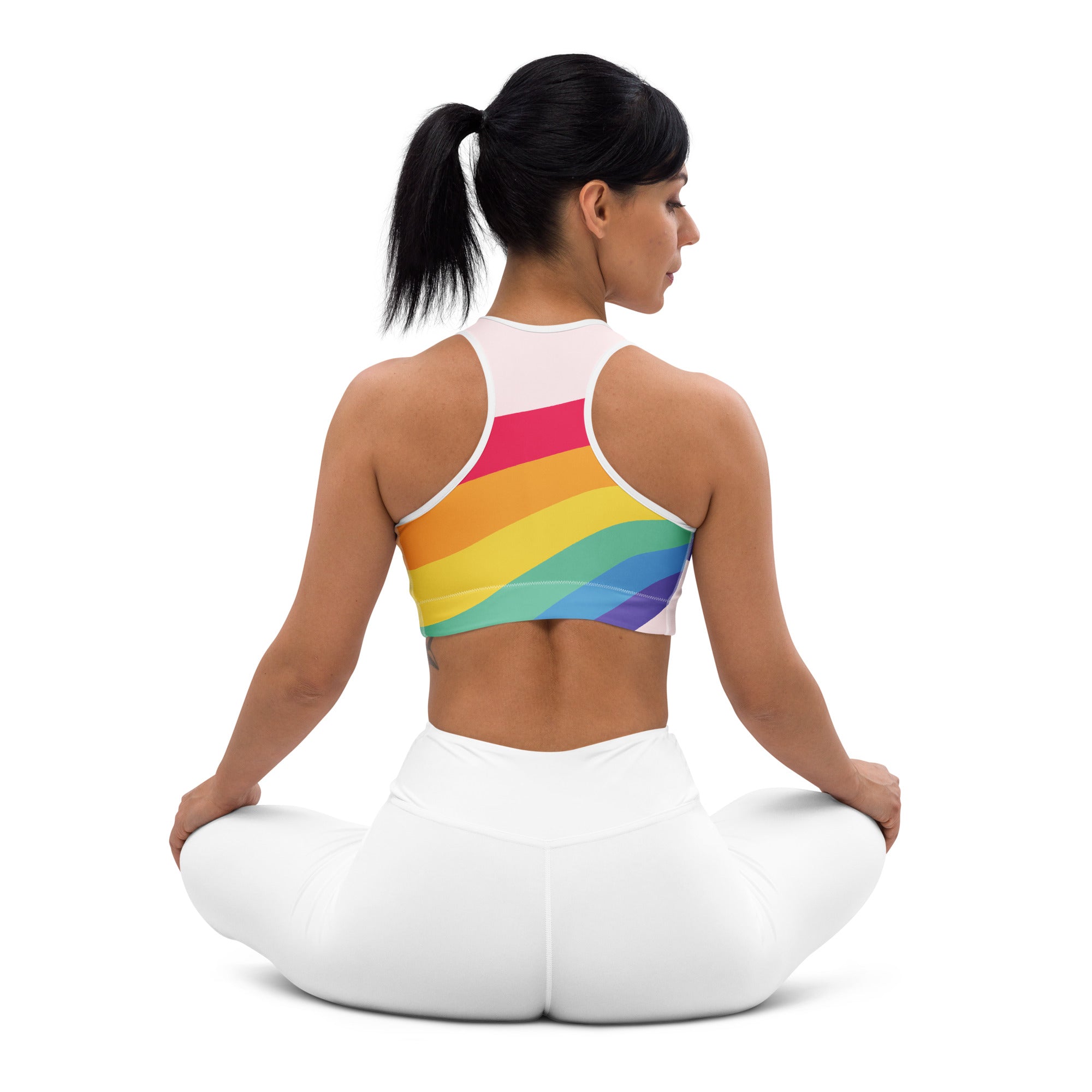 White quick drying sports bra with rainbow stripe design for women in LGBTQ rainbow wave style