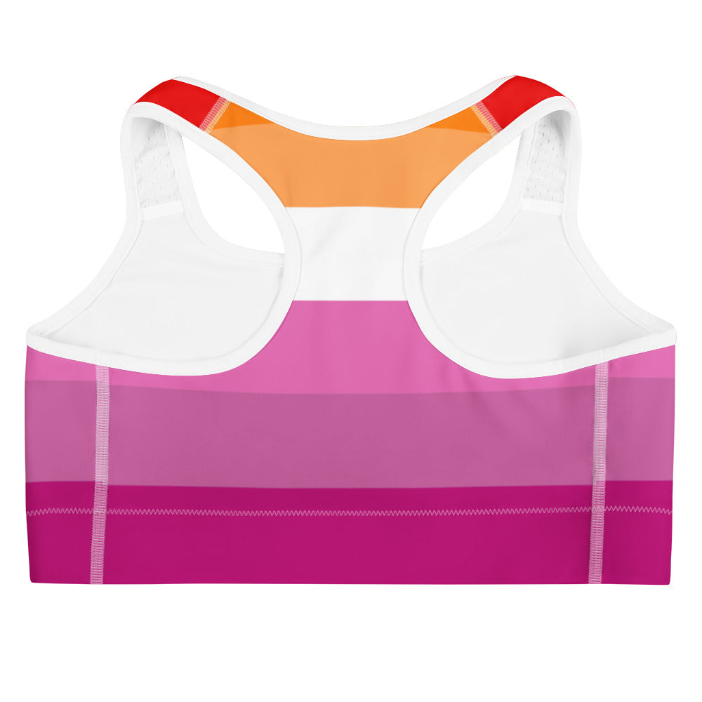 Women’s lesbian flag quick drying sports bra in vibrant pink white gradient with orange shoulder strap accents
