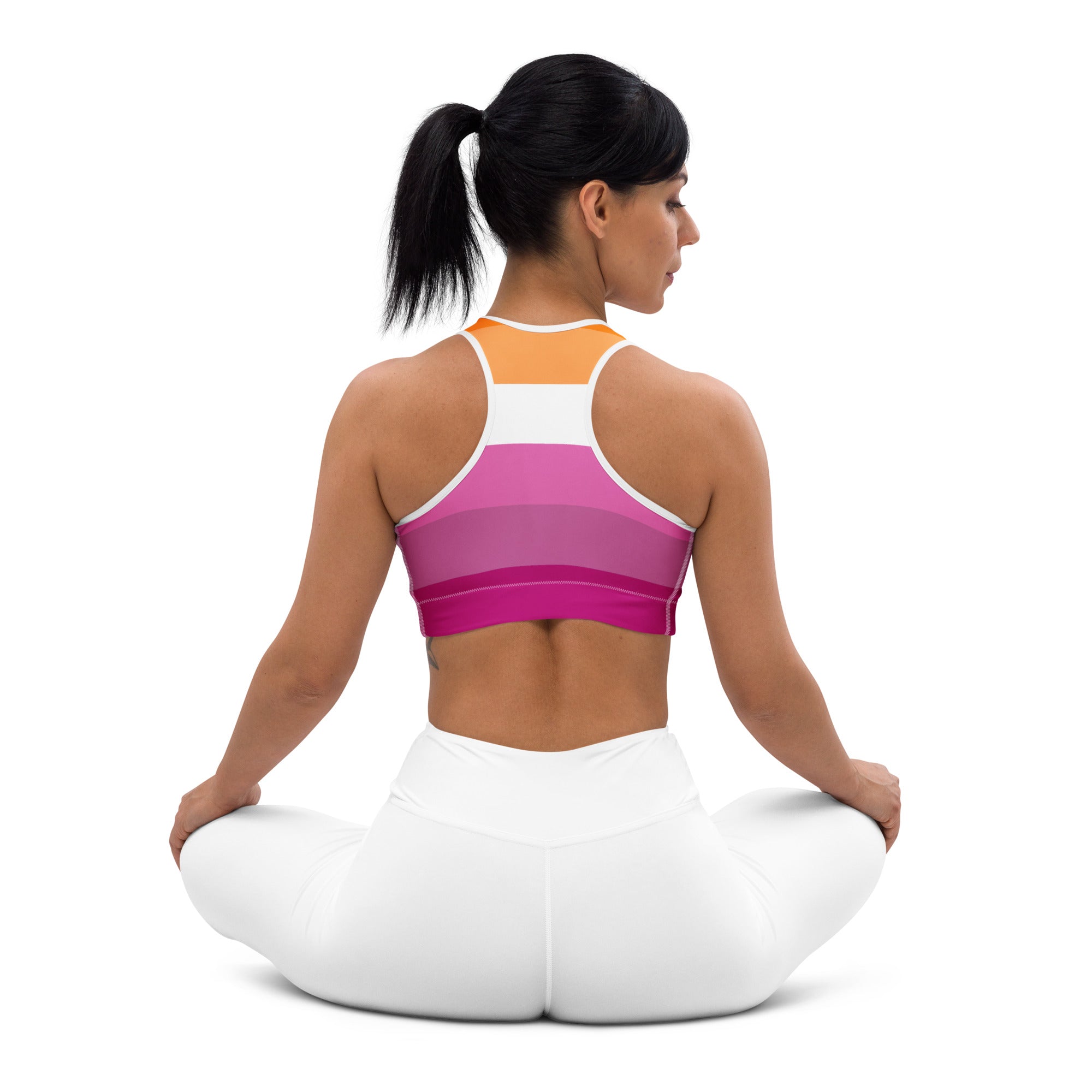 Women’s lesbian flag quick drying sports bra in vibrant orange white and pink gradient with sleek form fitting design