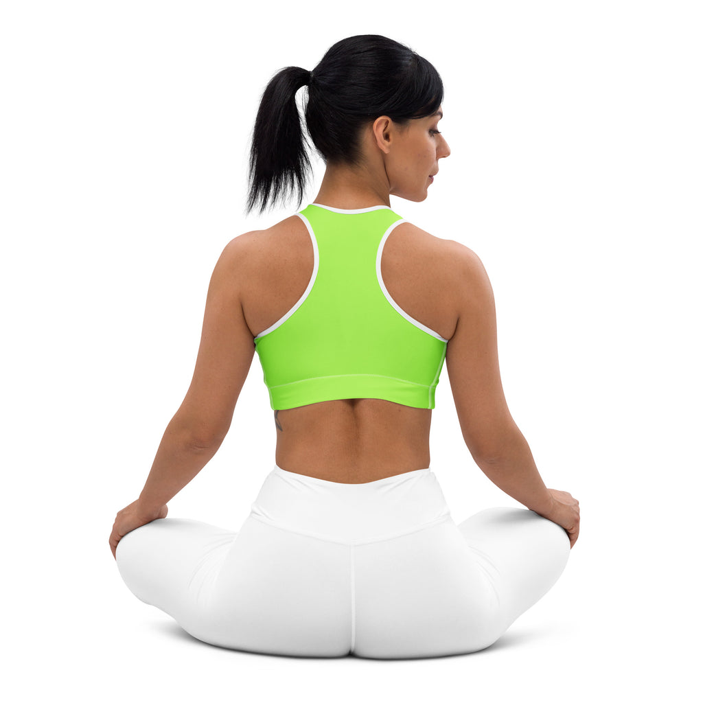 A vibrant lime green quick drying sports bra with white trim and racerback design for women