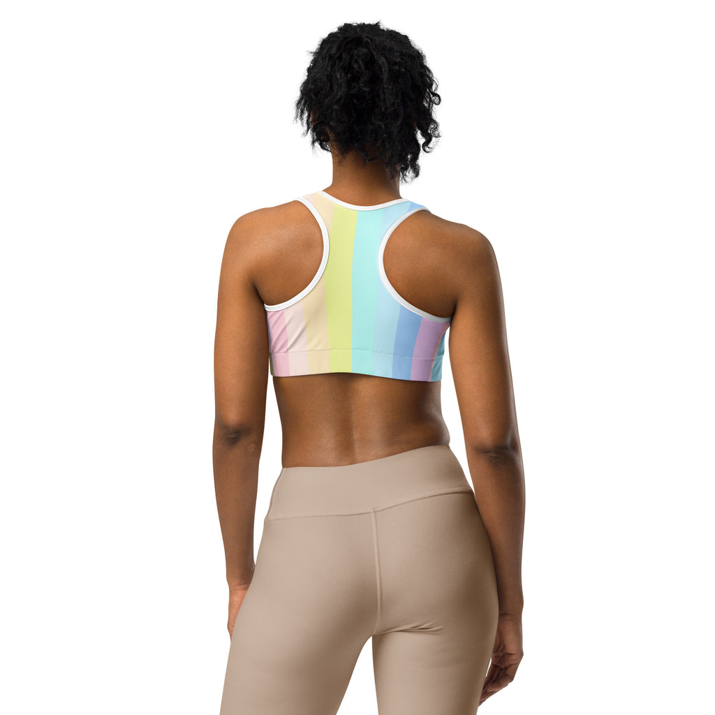 Women’s pastel rainbow stripe quick drying sports bra with white trim for active wear and exercise