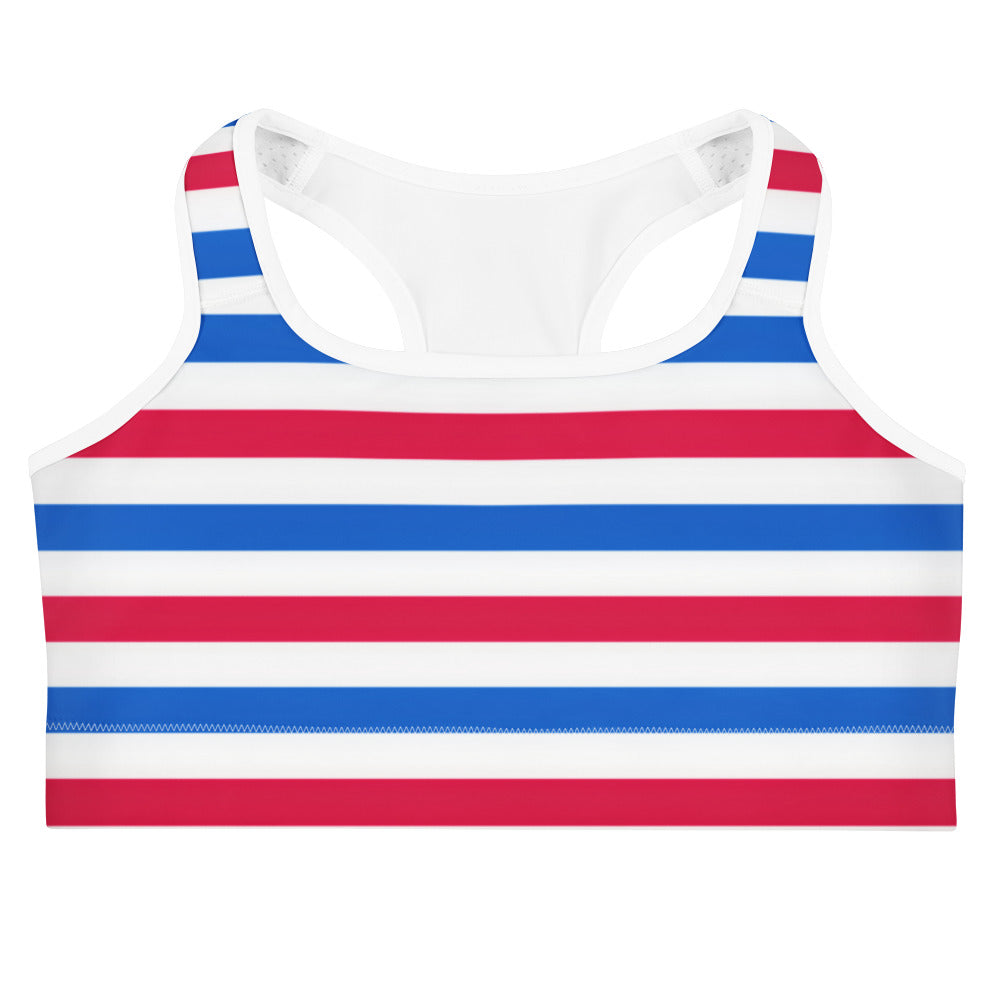 Women’s red white and blue quick drying sports bra with bold horizontal stripes and supportive racerback design visible from back
