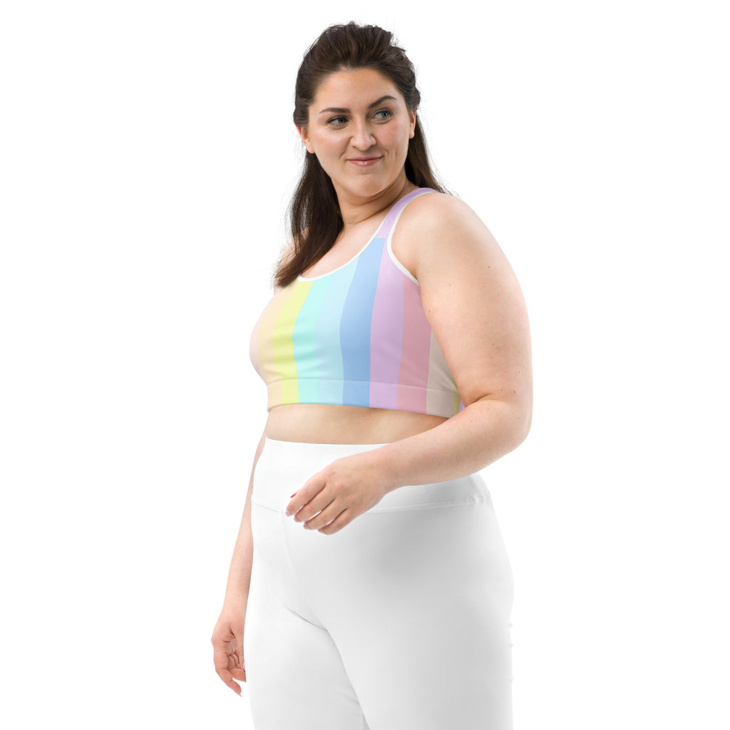 Women’s pastel rainbow stripe quick drying sports bra with striped crop top design shown from the front