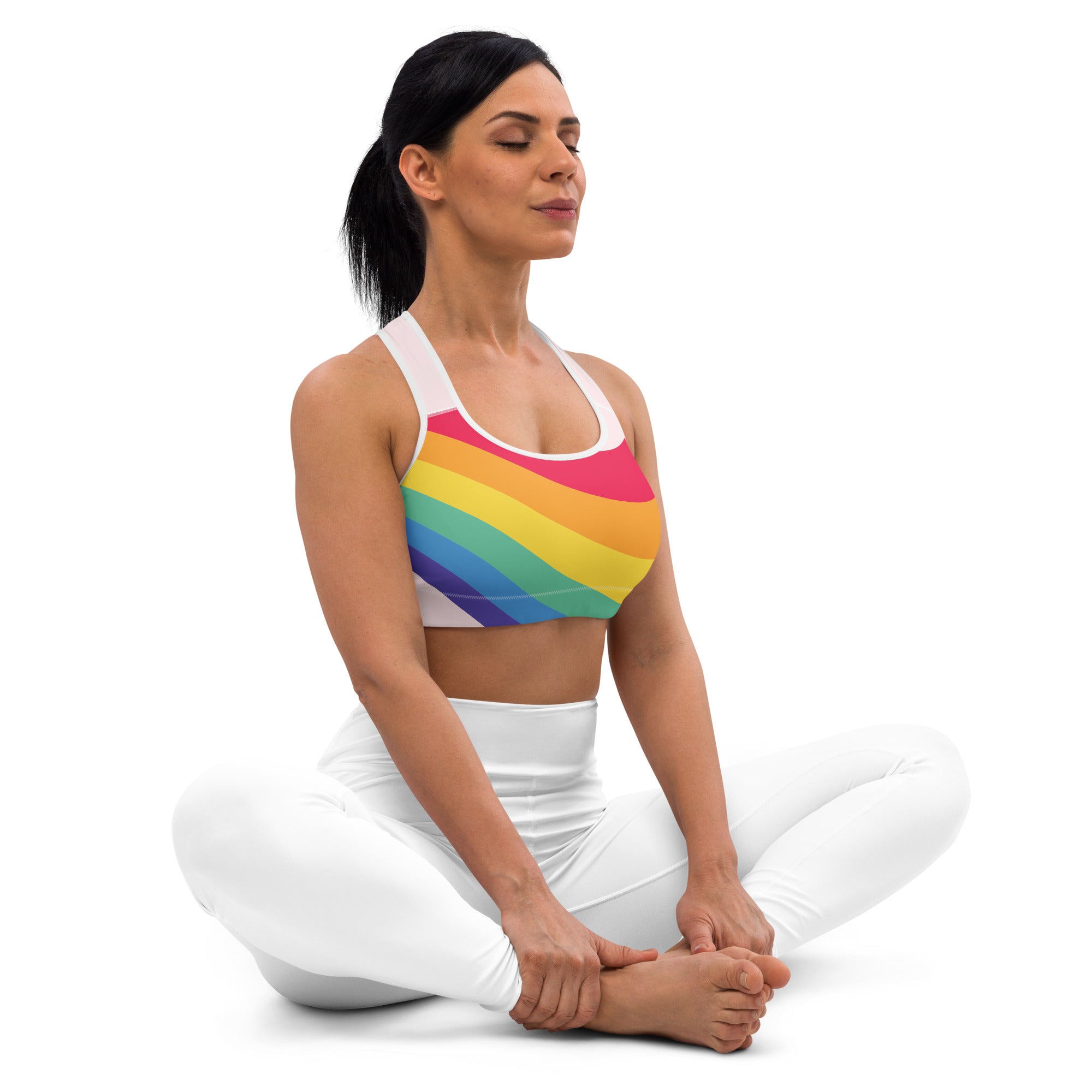 Women’s rainbow wave LGBTQ quick drying sports bra with rainbow stripes white straps and sleek form fitting design