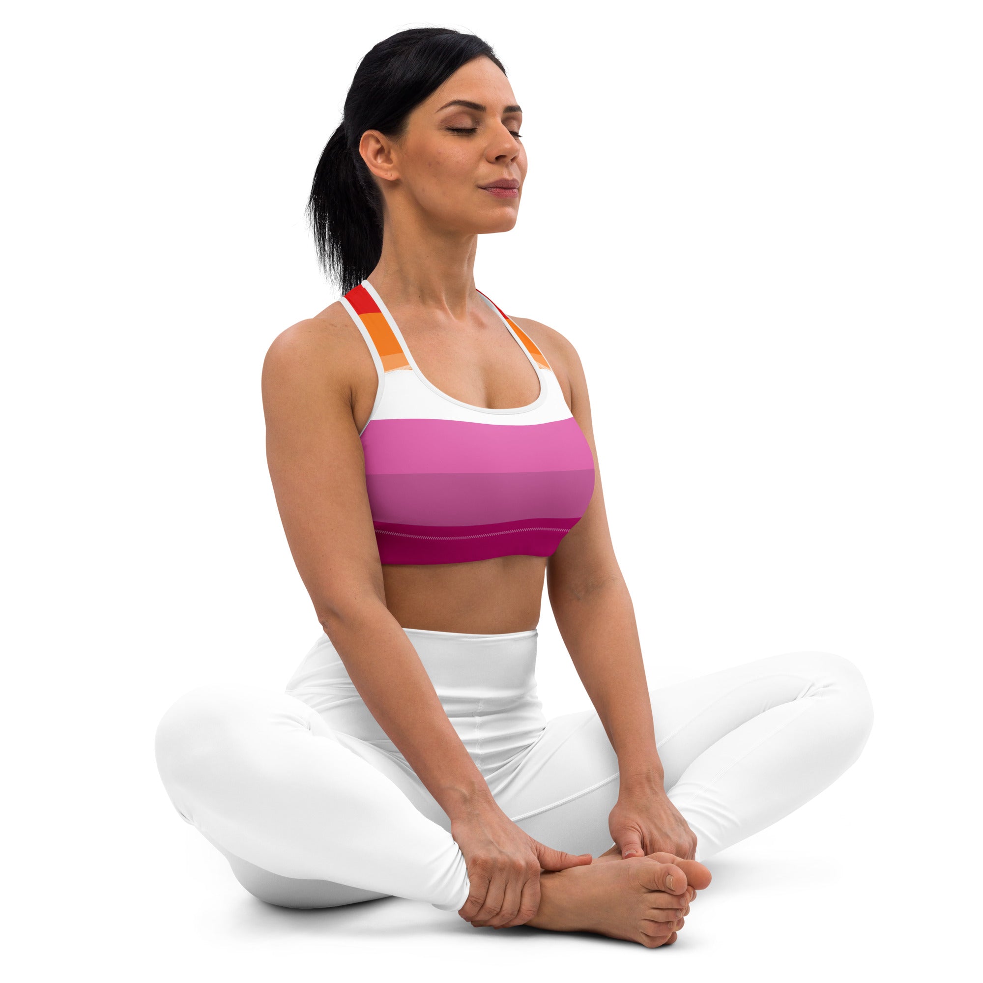 A vibrant gradient pink and white quick drying sports bra with orange trimmed straps for women lesbian flag support
