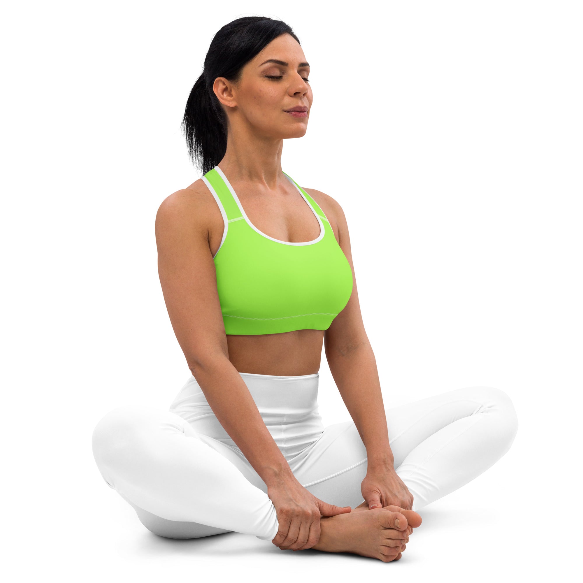 Women’s lime green quick drying sports bra with white trim and racerback straps for active workouts