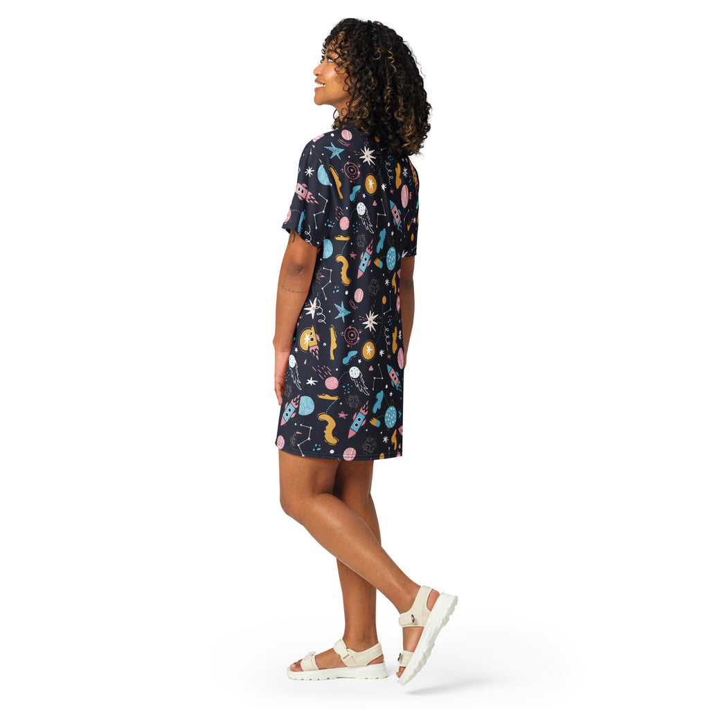 Women’s outer space t-shirt dress in navy blue with short sleeves and playful pastel rockets stars and planets print