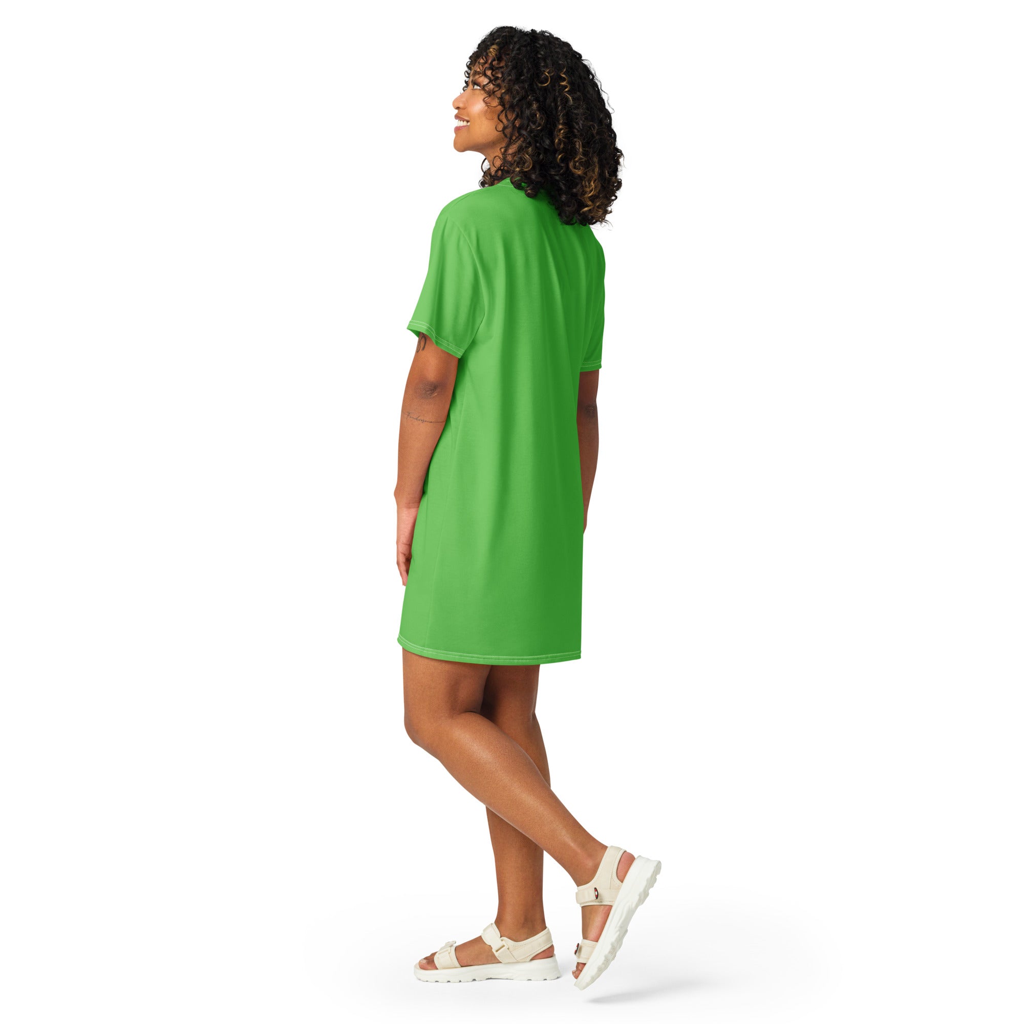 A vibrant green short-sleeved t-shirt dress with a relaxed fit and rounded neckline for women