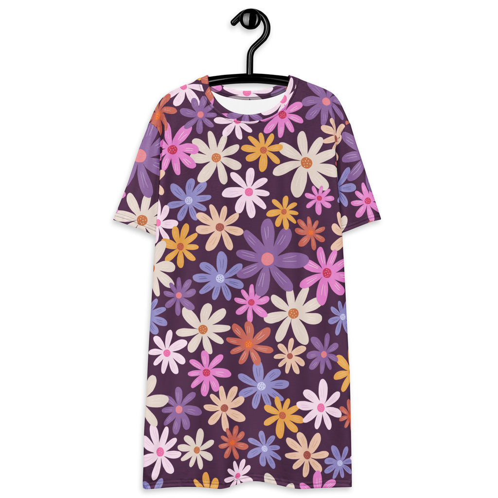 Women’s retro floral t-shirt dress in vibrant purple with pink white yellow and blue daisy print featuring orange centers