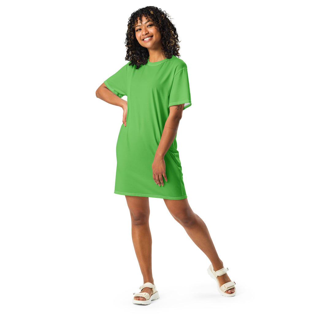 A vibrant green women’s t-shirt dress with short sleeves, relaxed fit, and simple round neckline